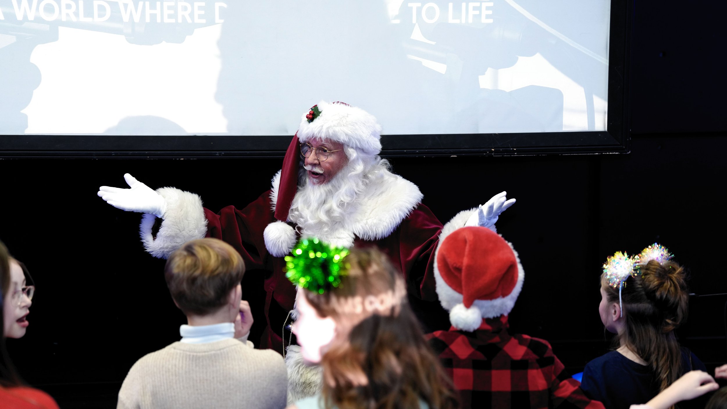 photo report from the LUME Christmas Party 2025 with Santa Edmonton
