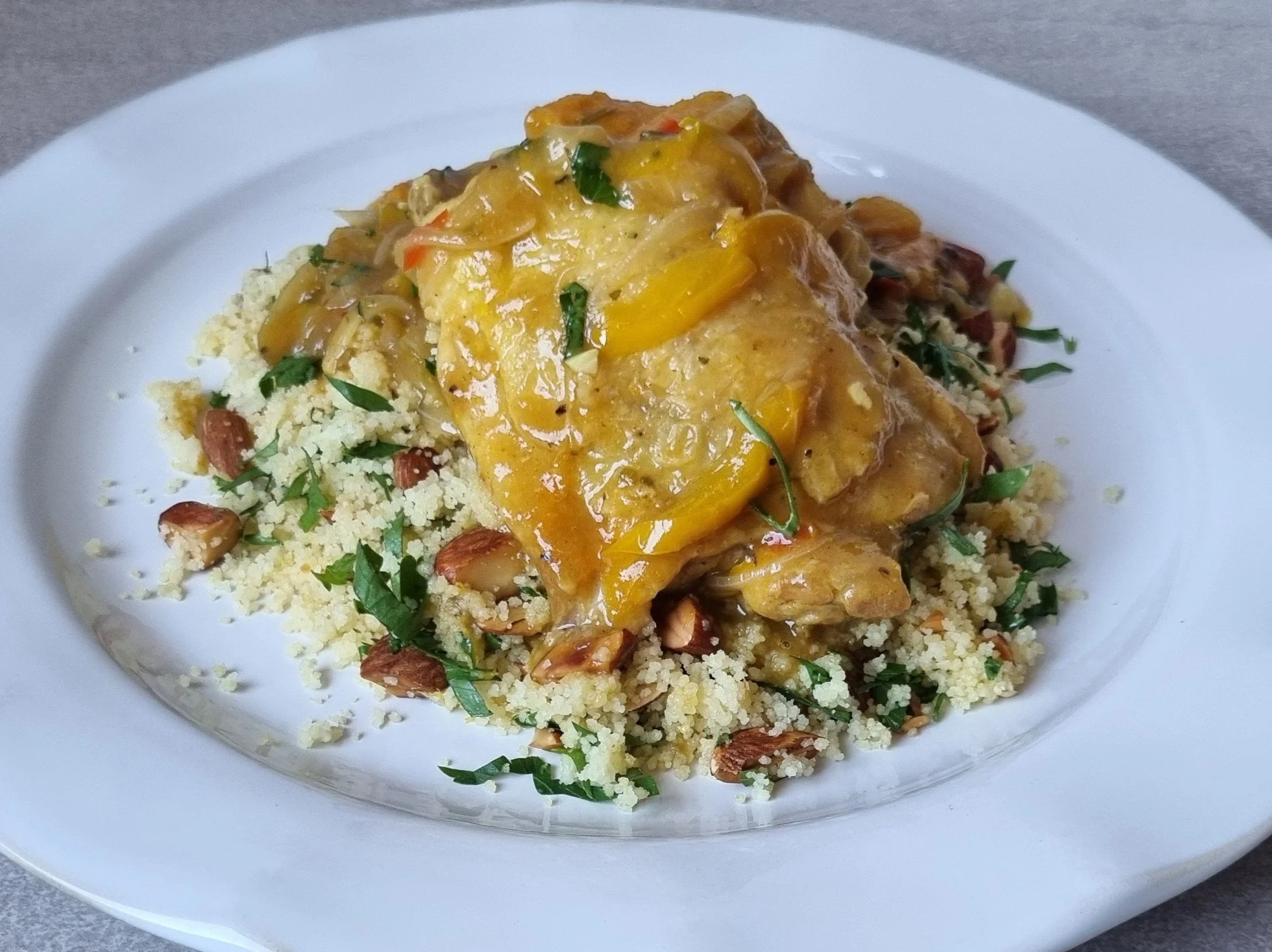 Apricot chicken with almond and lemon cous cous