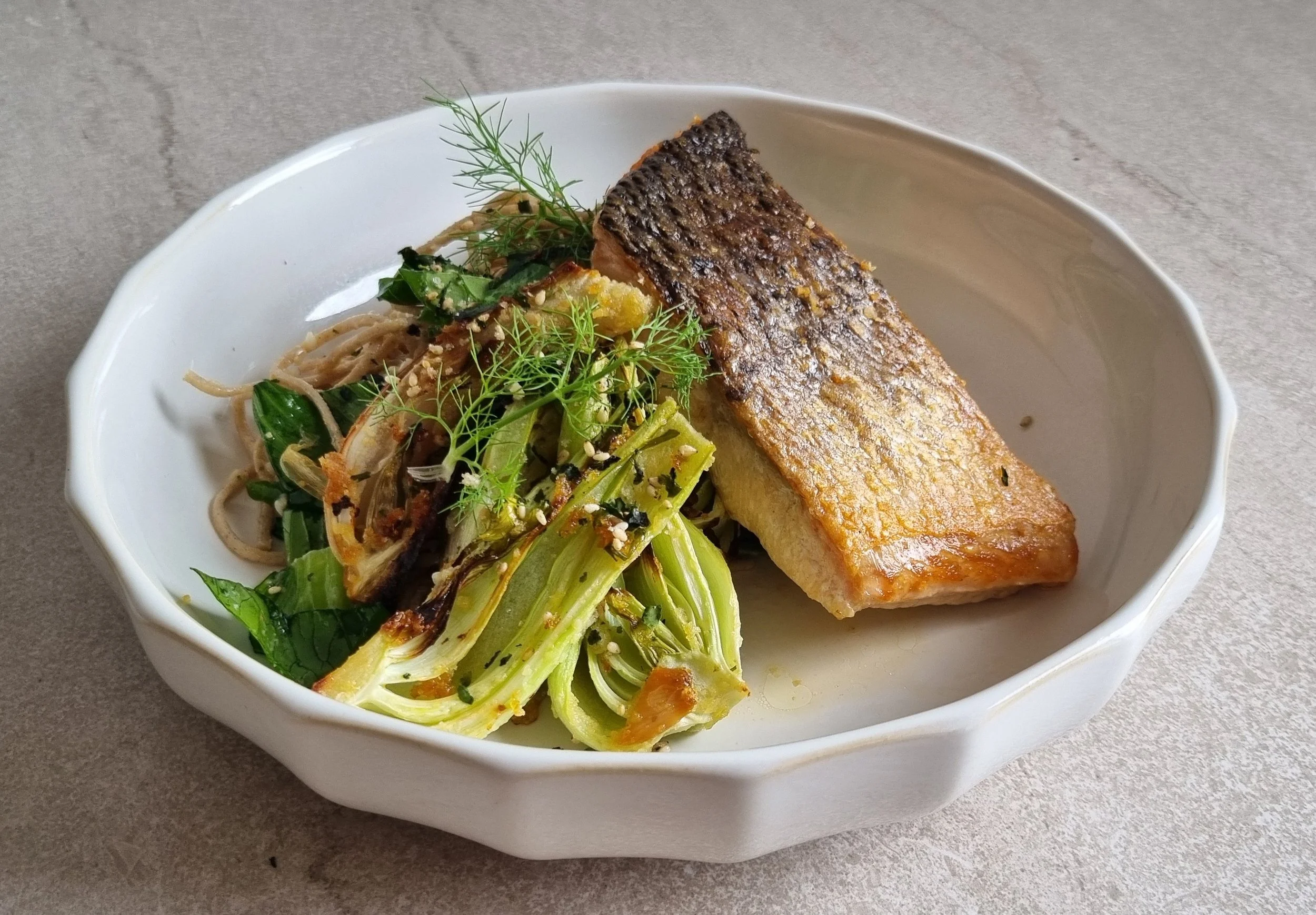 Crispy skin salmon with roasted bok choy, fennel and miso noodles