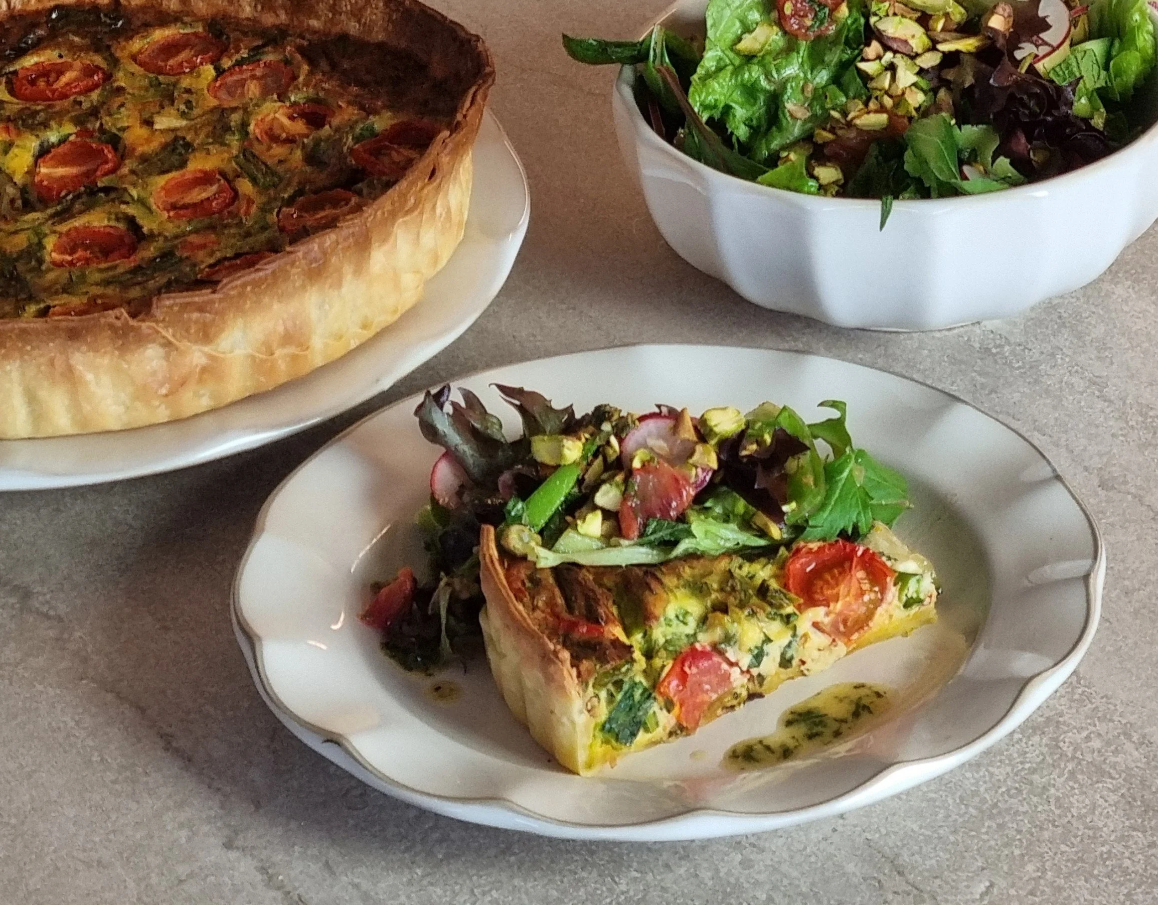 Spring onion quiche with citrus spring salad
