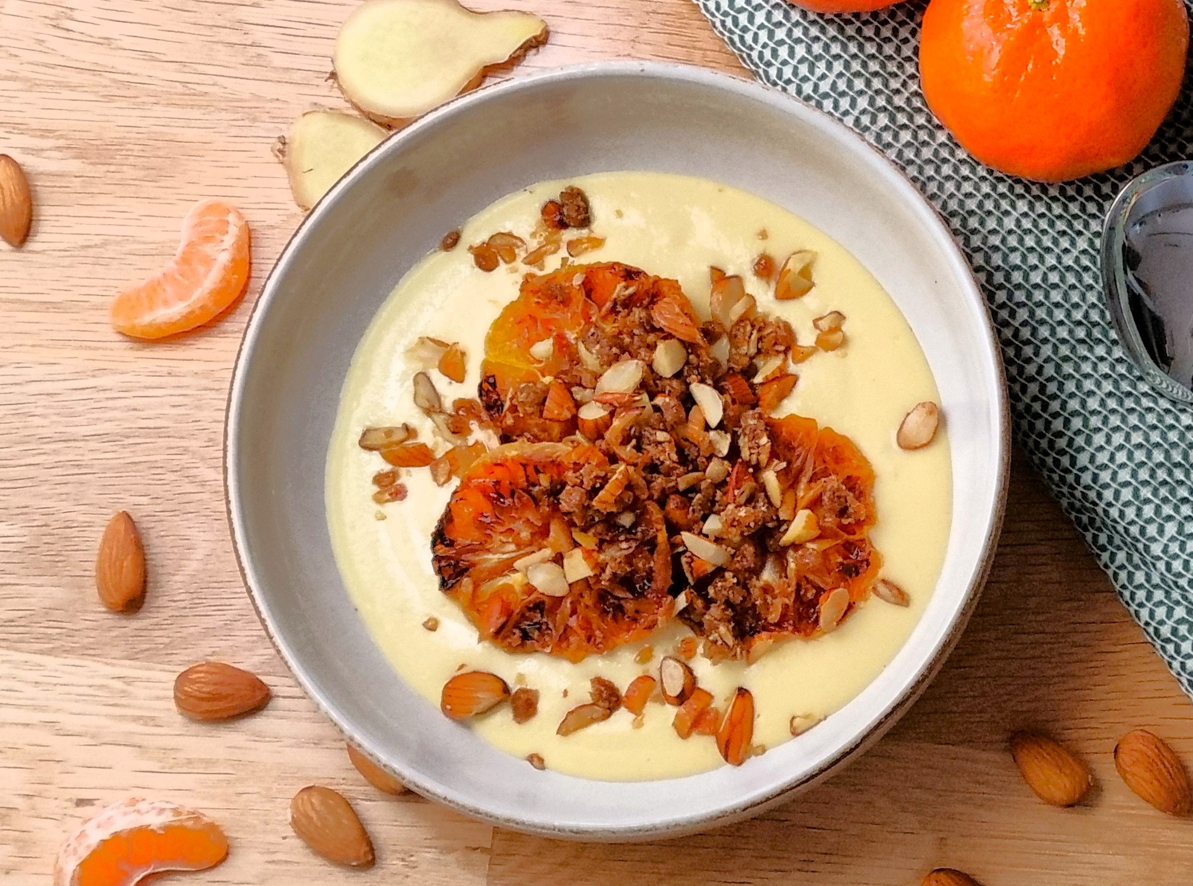 Pan roasted mandarin with ginger custard & almond crumble