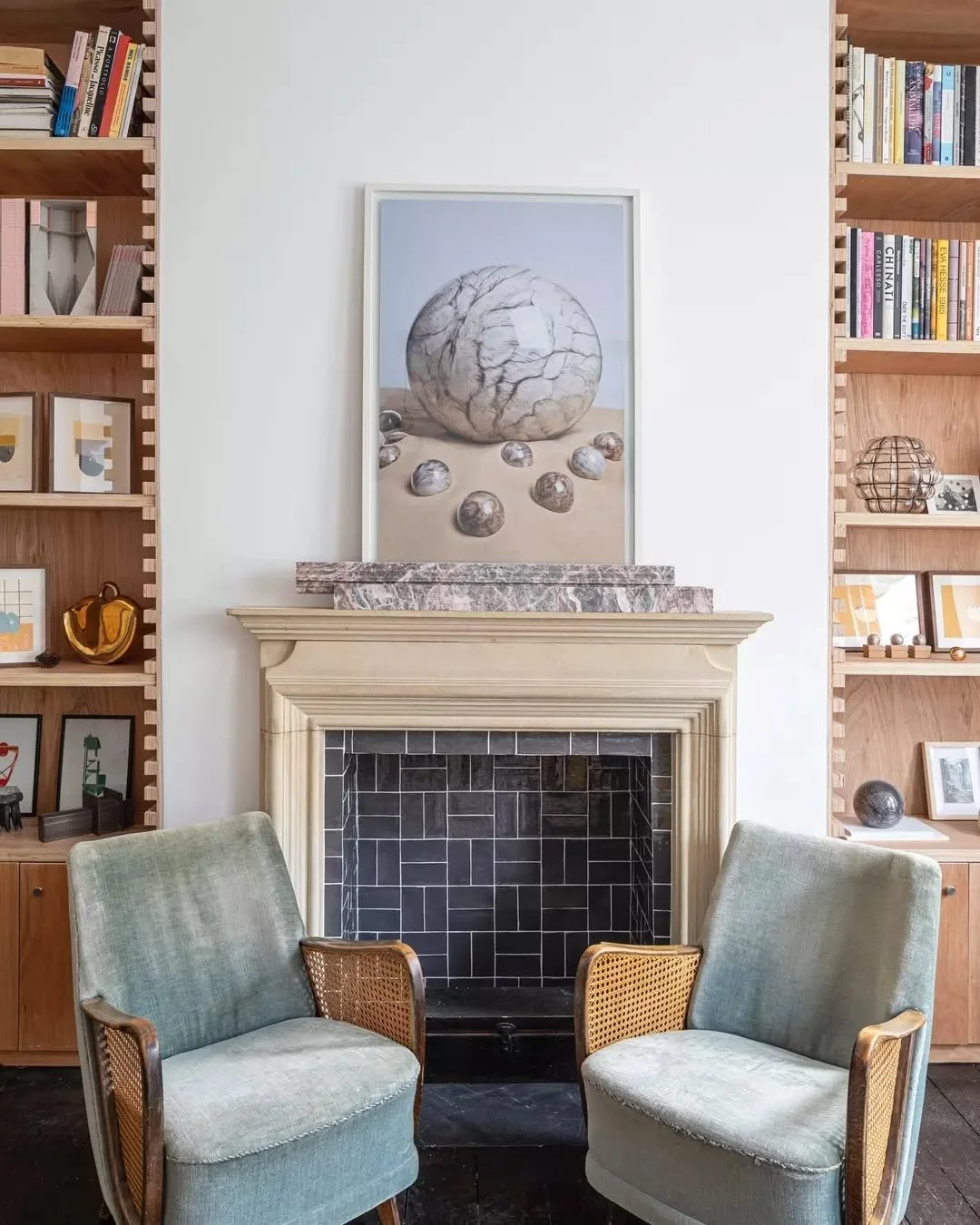For this project we experimented with a mixture of materials including a custom designed plywood shelving unit, creatively tiling the fireplace in addition to vintage furnishings. This balanced design fit the practical and aesthetic requirements for 