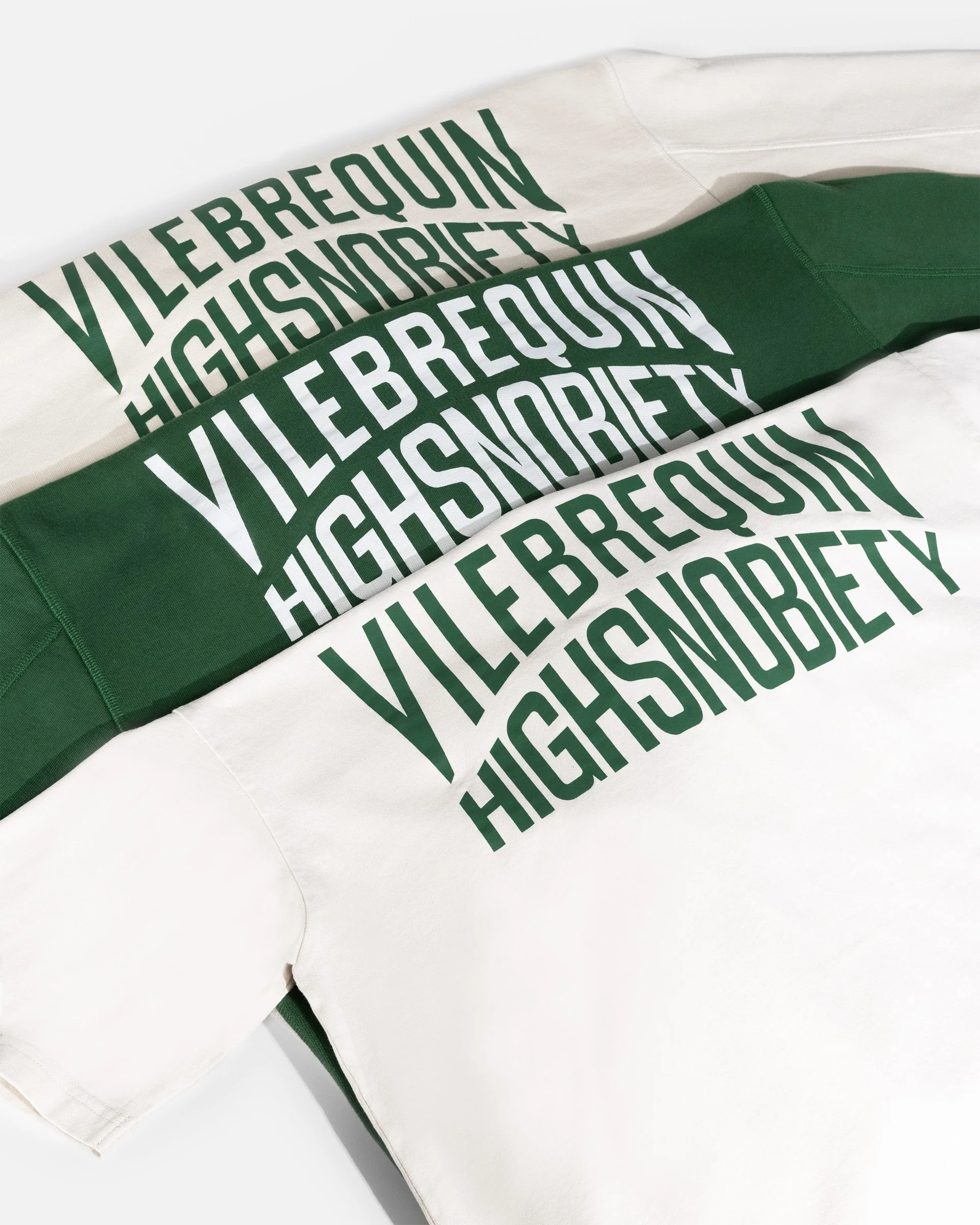 Trois sweatshirts blancs et verts avec le texte 'VILEBREQUIN' et 'HIGHSNOBIETY' en lettres vertes et blanches.