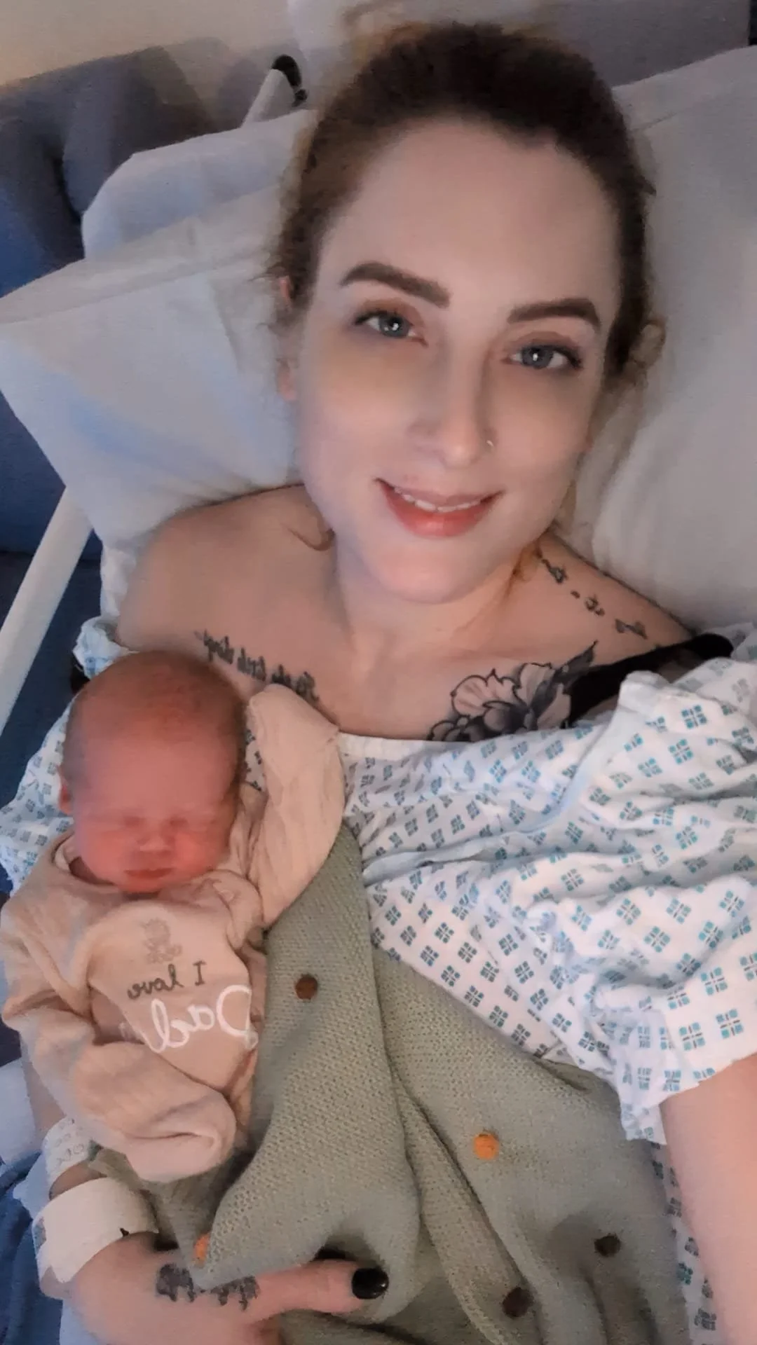 A mum with a newborn on her chest doing skin to skin after giving birth