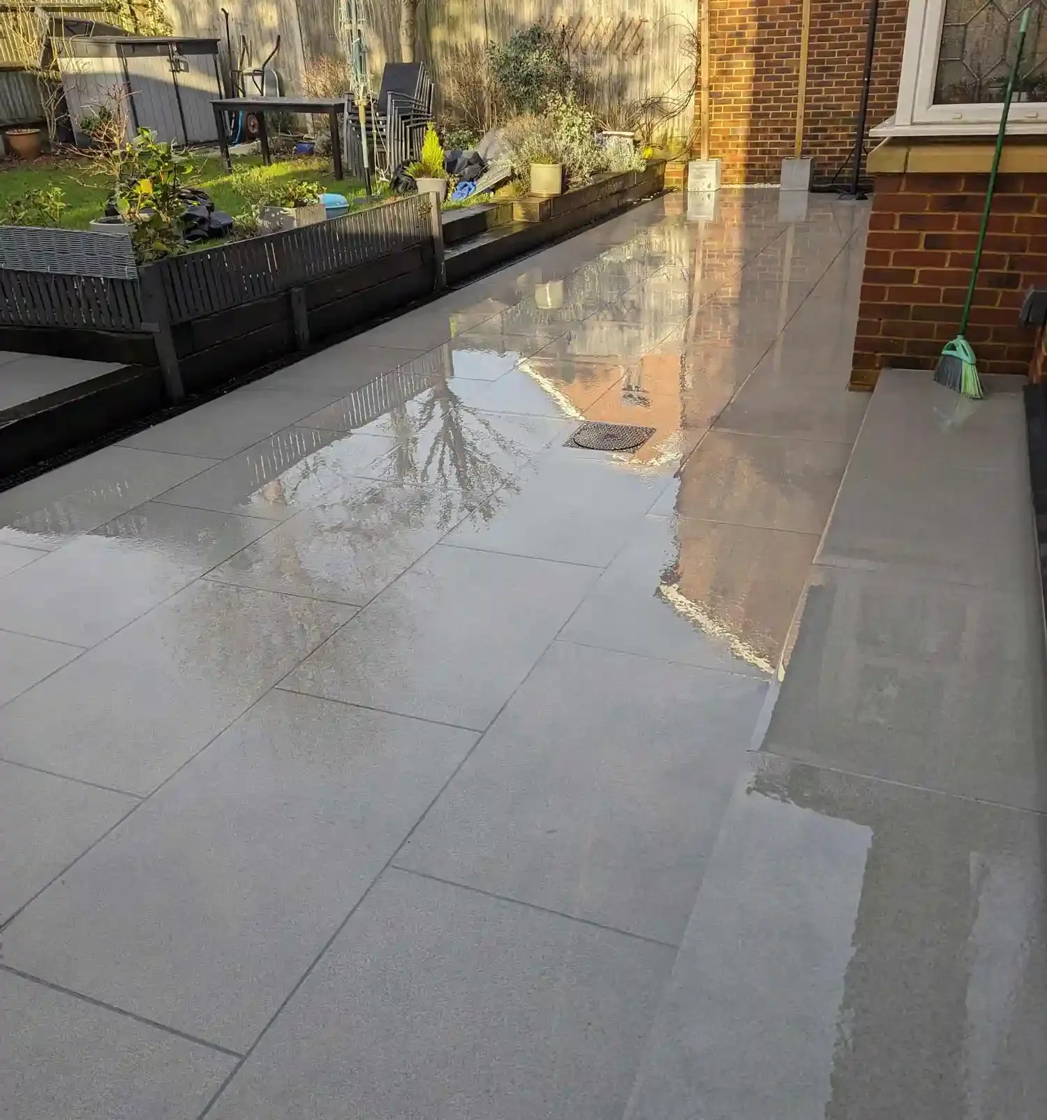 A porcelain patio deep cleaned by Brilliant Sheen patio cleaning in Woking Surrey