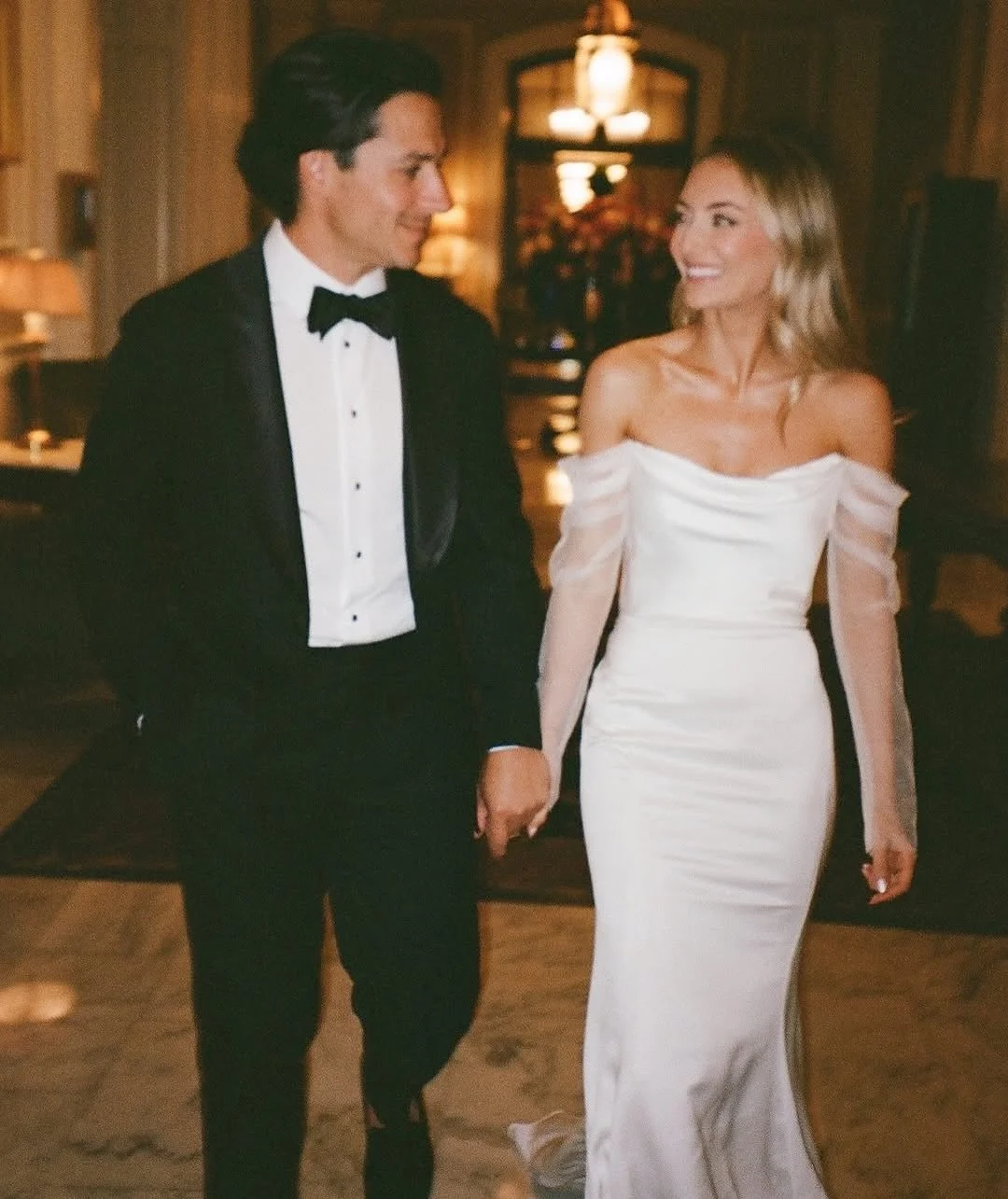 Bride @kayteramagano wearing the Olivia gown 🫶🏻 We are absolutely captivated by this look 👀  captured by @tess.schilke