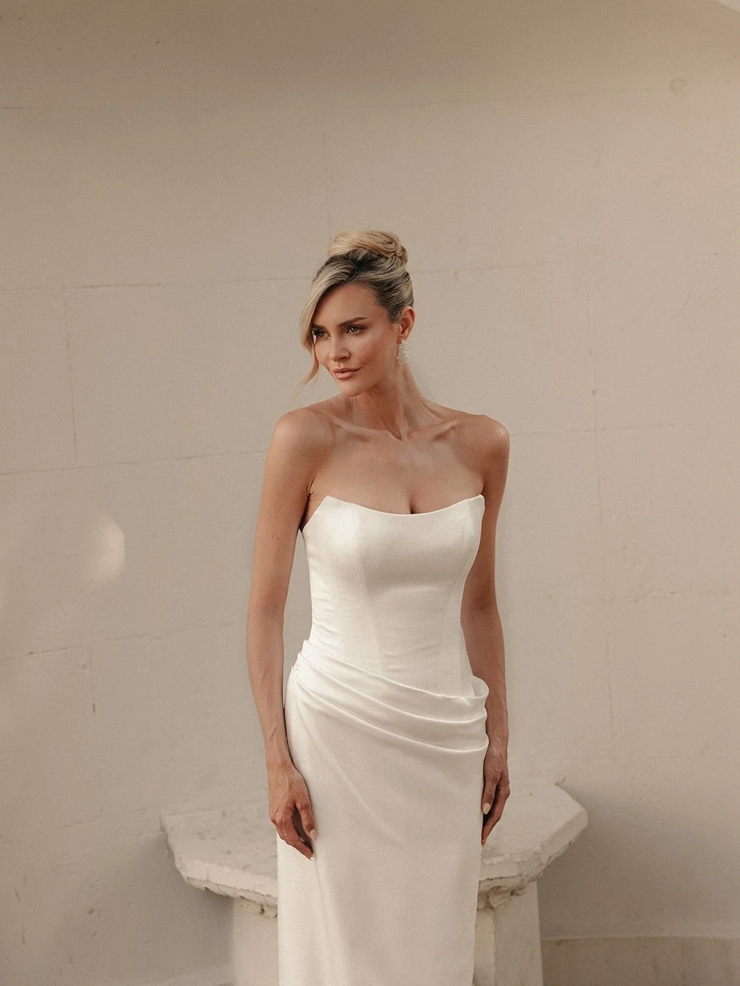 Minimal, modern, timeless 

Meet Faye by Love Story London a sleek satin fitted gown made for brides who love understated elegance with a bold, confident edge 🤍