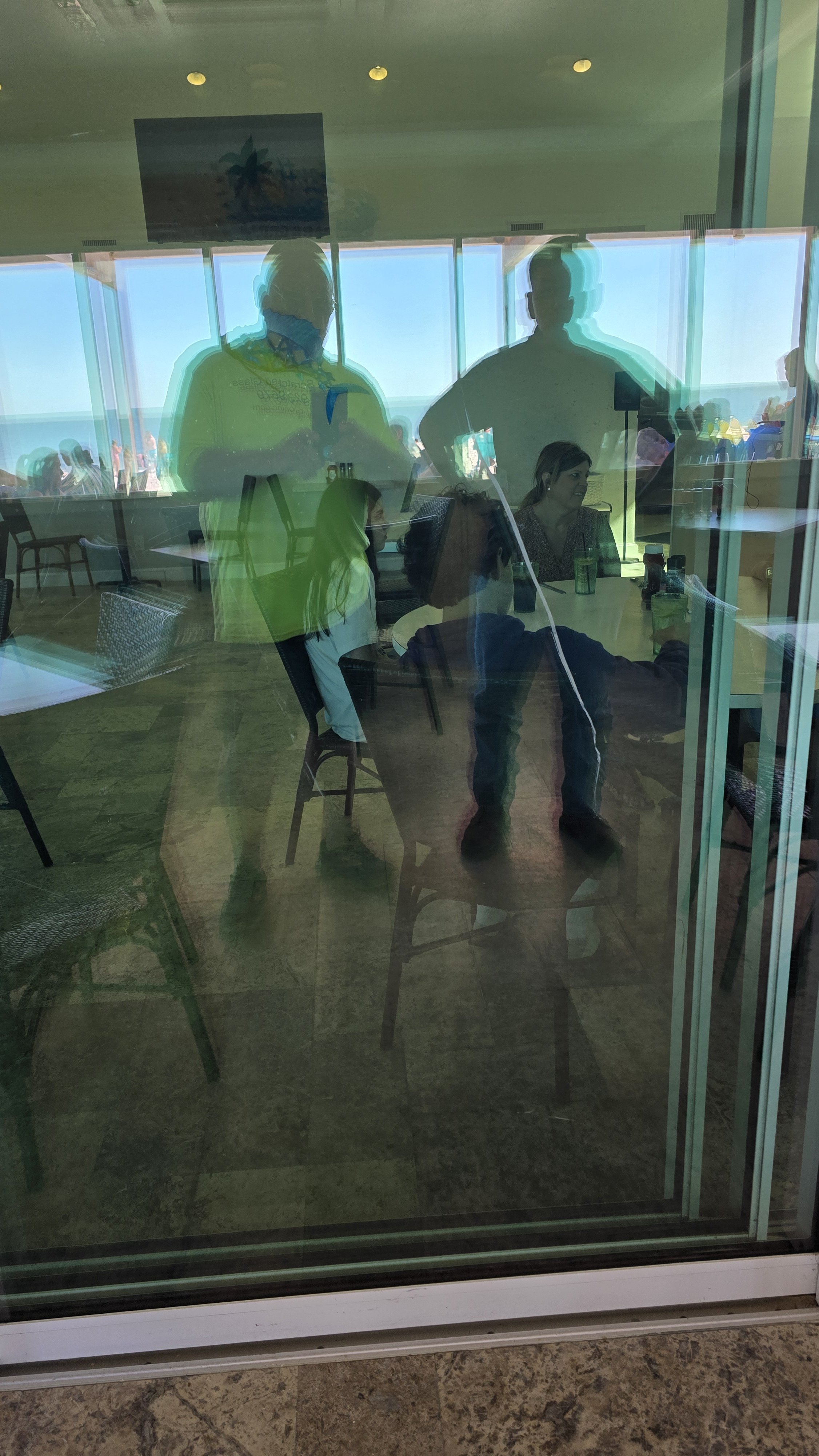 Scratched commercial glass in Boca Grande FL — Glass Restoration Inc. completed verified glass restoration at South Beach Bar & Grille, 760 Gulf Blvd, Boca Grande.