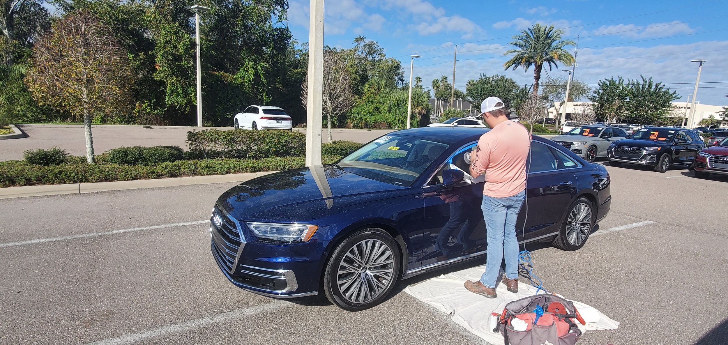 Audi with scratched glass being repaired for the Dealership in Sarasota