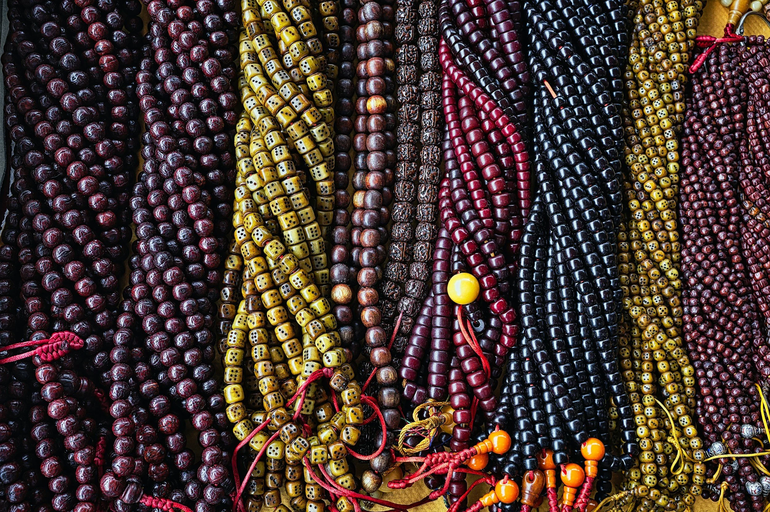 A colorful array of modern glass beads, the same decorative art form that has existed since the earliest days of glassmaking nearly 3,500 years ago