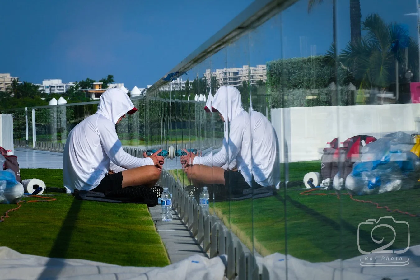 glass railing scratched and has mineral deposit. Glass Restoration Inc repairs scrached glass. Remove mineral deposits from glass.