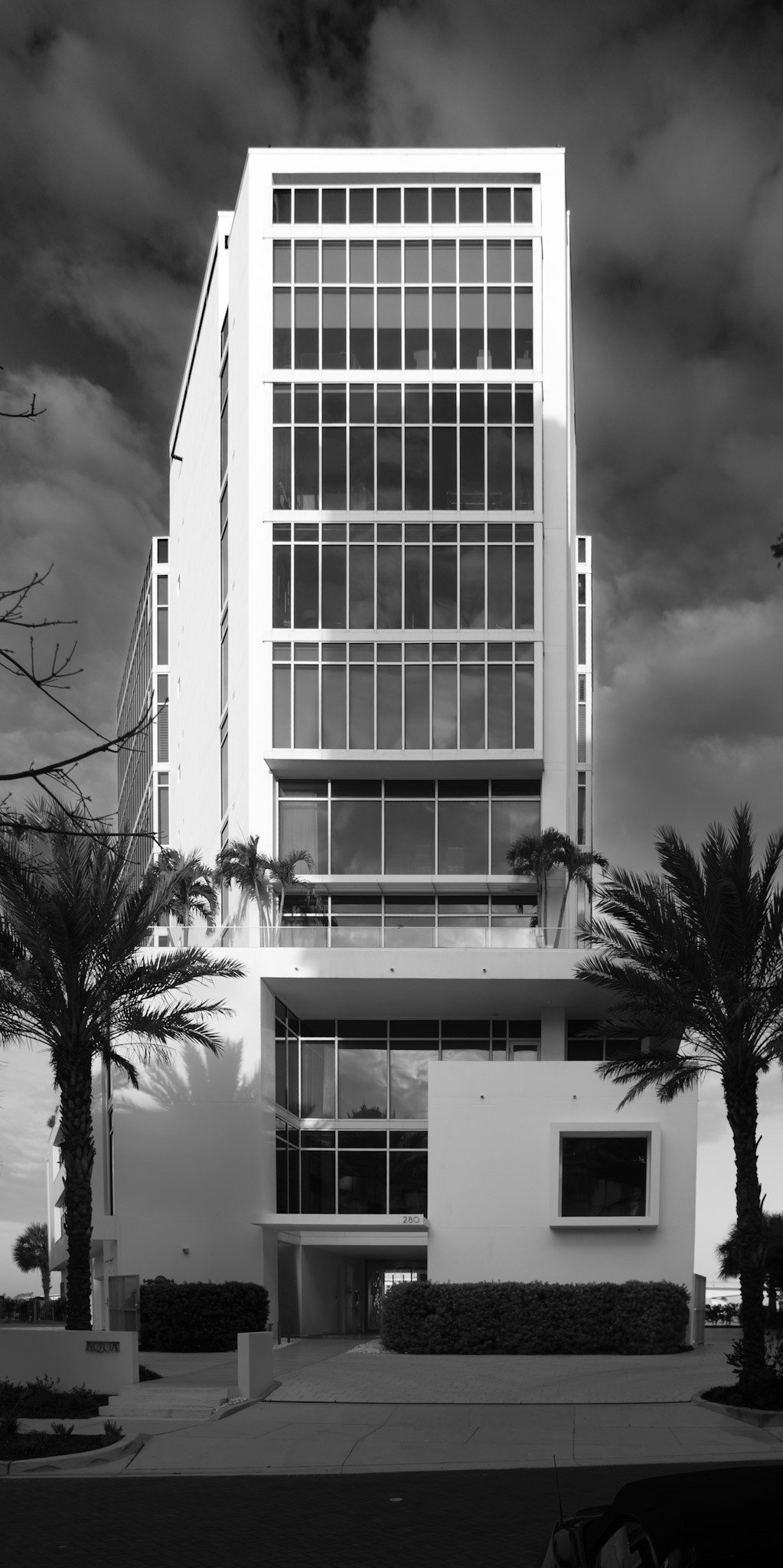 Aqua Sarasota at 280 Golden Gate Point — Guy Peterson architecture and full-floor bayfront residences served by Glass Restoration Inc.