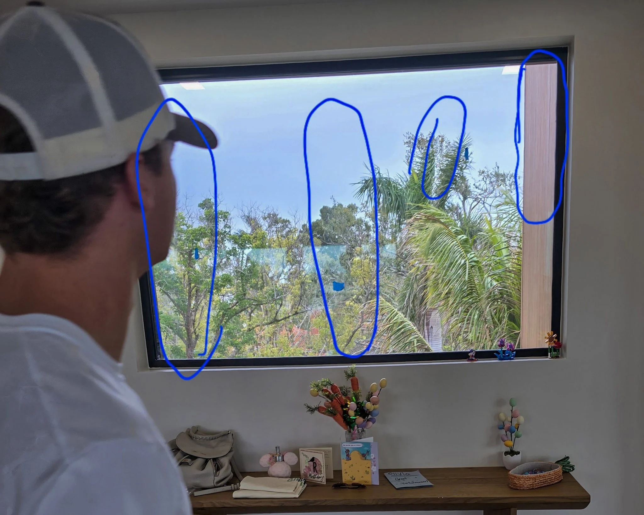 second story window scratched on the inside. Custom Builder in Sarasota