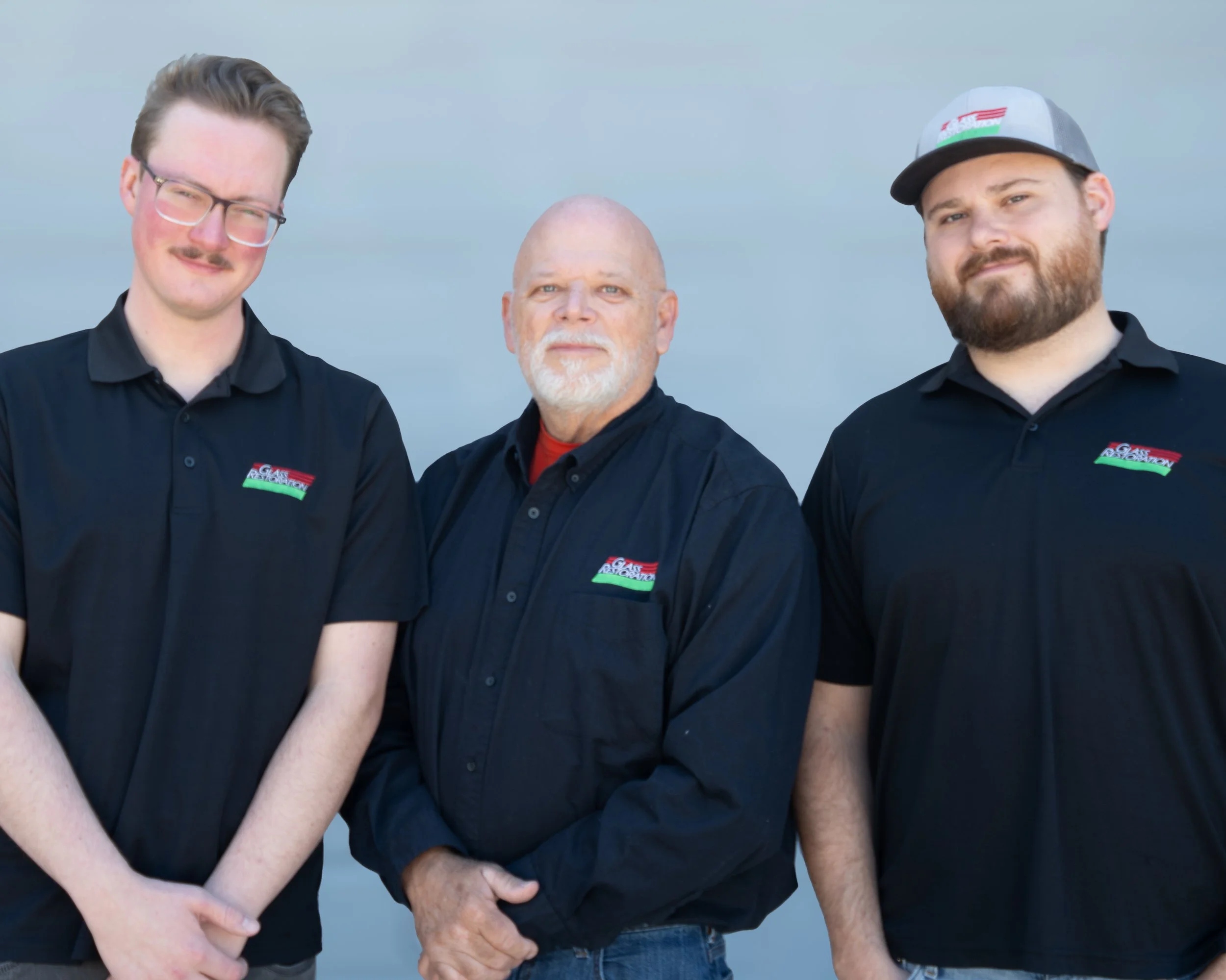 Company owners Skyeler, Barry, and Stanton of Glass Restoration Inc., providing professional and friendly glass repair services for Florida homeowners