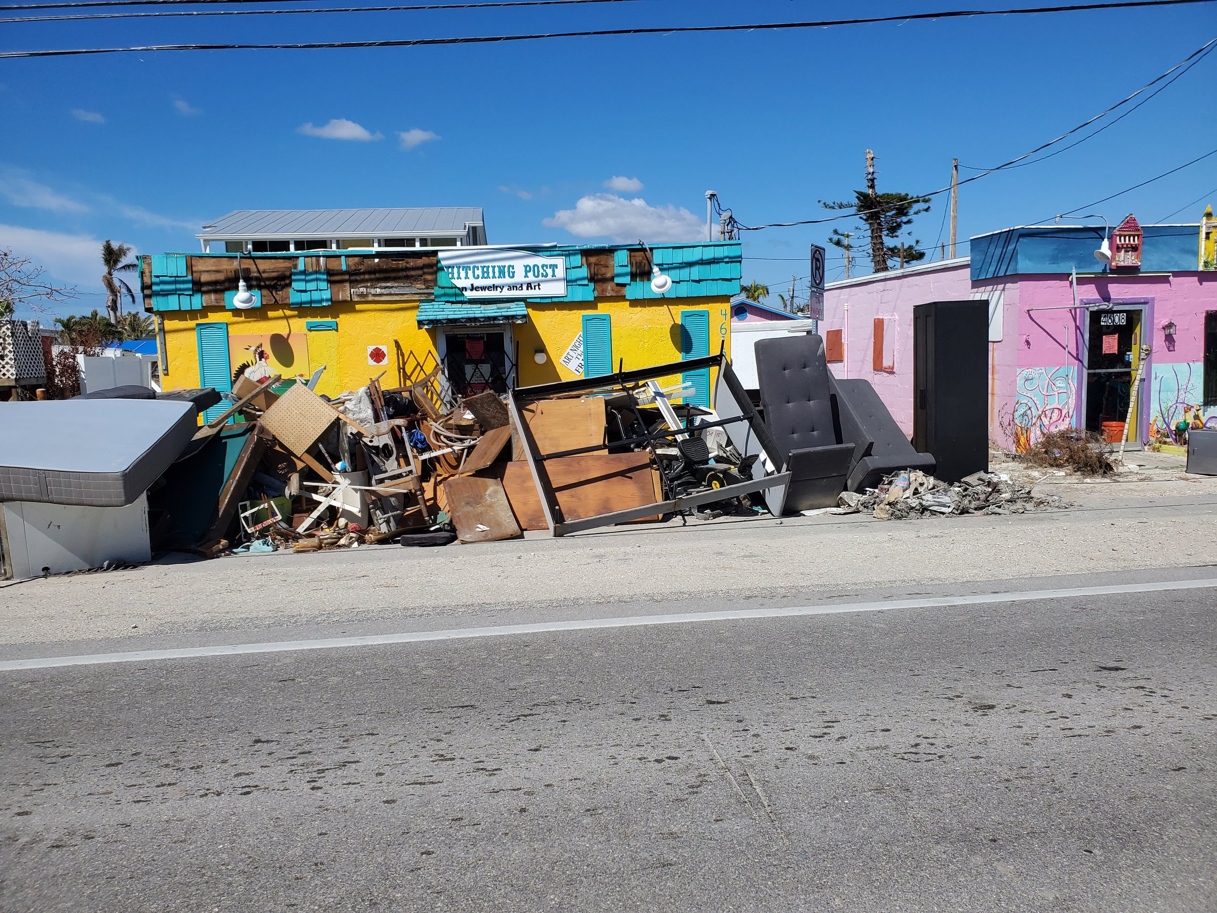 Devestated buildings on Matlacha following Hurricane Ian.Glass Restoration Inc serves Lee County home and business owners with hurricane damage assessment a restoration determining restorability before replacement costs are assumed