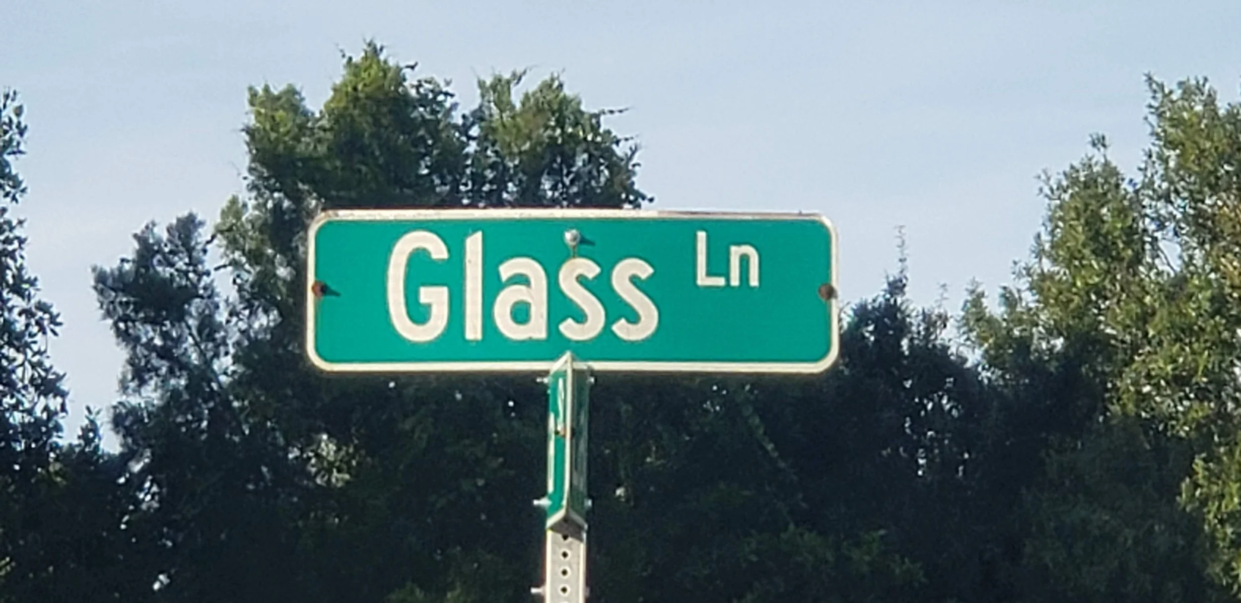 Glass Lane street sign at Woodland Preserve Parrish — Glass Restoration Inc. the glass restoration specialists serving Kolter Homes 55+ communities in Manatee County