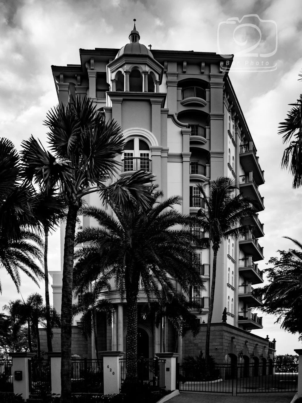 Grande Riviera at 420 Golden Gate Point Sarasota — 13 Mediterranean-style luxury residences with panoramic bay views and copper dome landmark, glass scratch repair by Glass Restoration Inc.