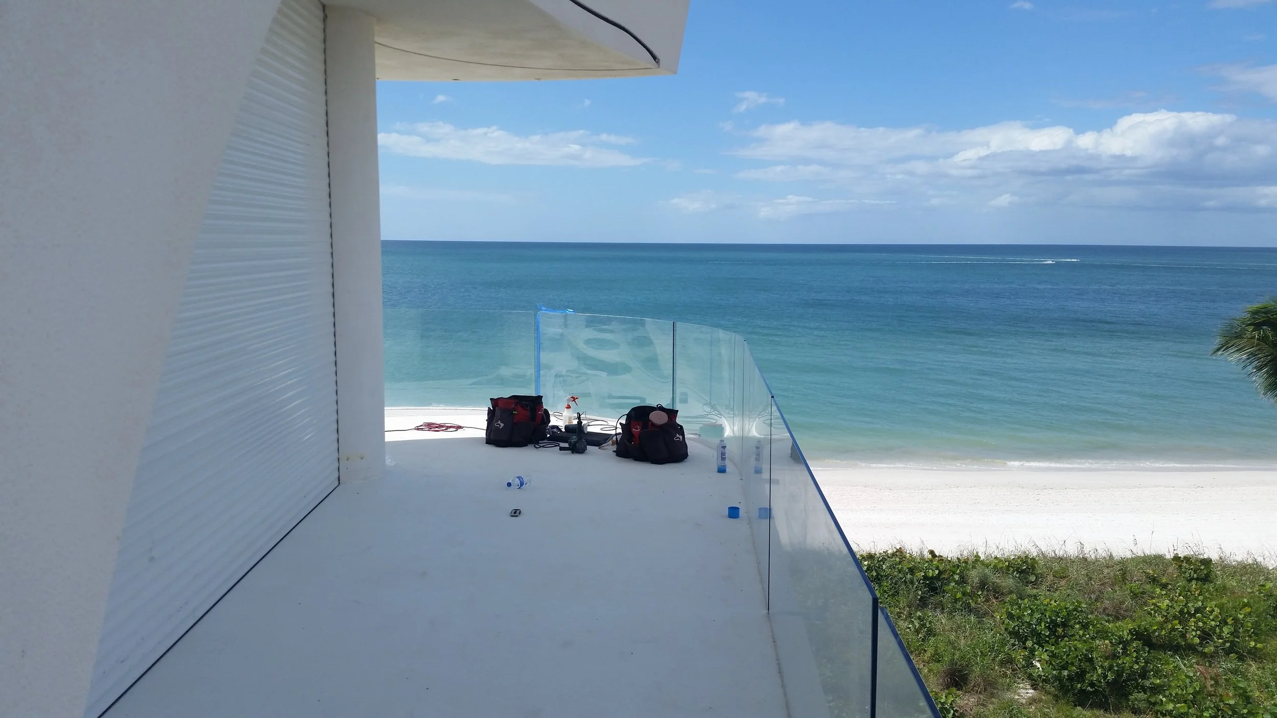 Curved radius glass scratch repair and restoration by Glass Restoration Inc. — serving luxury homes, classic cars, yachts, and architectural glass throughout Florida.