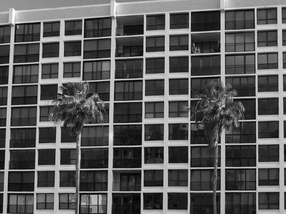 One Watergate Sarasota at 1111 Gulfstream Avenue — 104-residence downtown bayfront high-rise with panoramic bay views, glass scratch repair by Glass Restoration Inc.