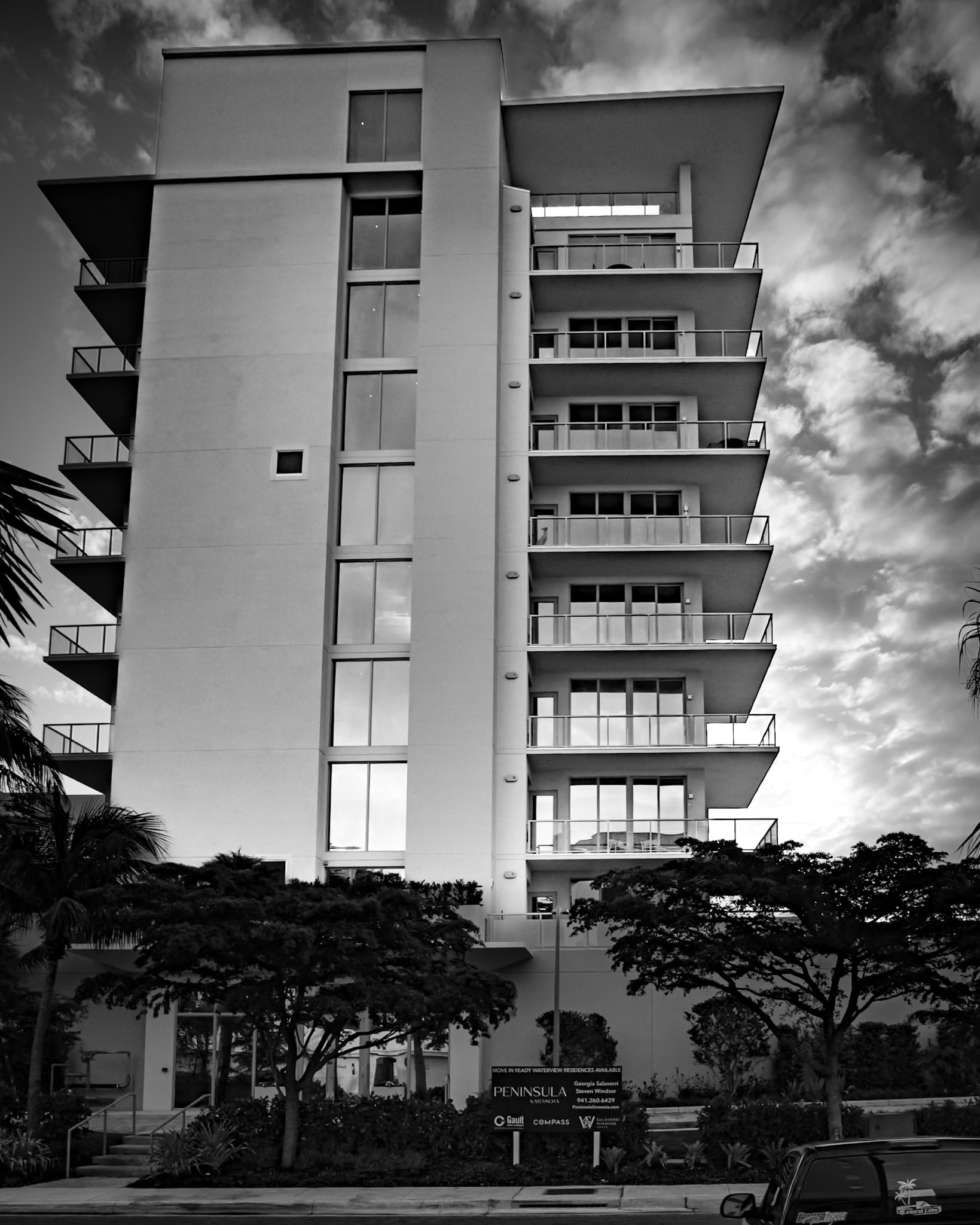 Peninsula Sarasota two-tower boutique condominium at 223 and 283 Golden Gate Point, downtown Sarasota FL — glass scratch repair by Glass Restoration Inc.