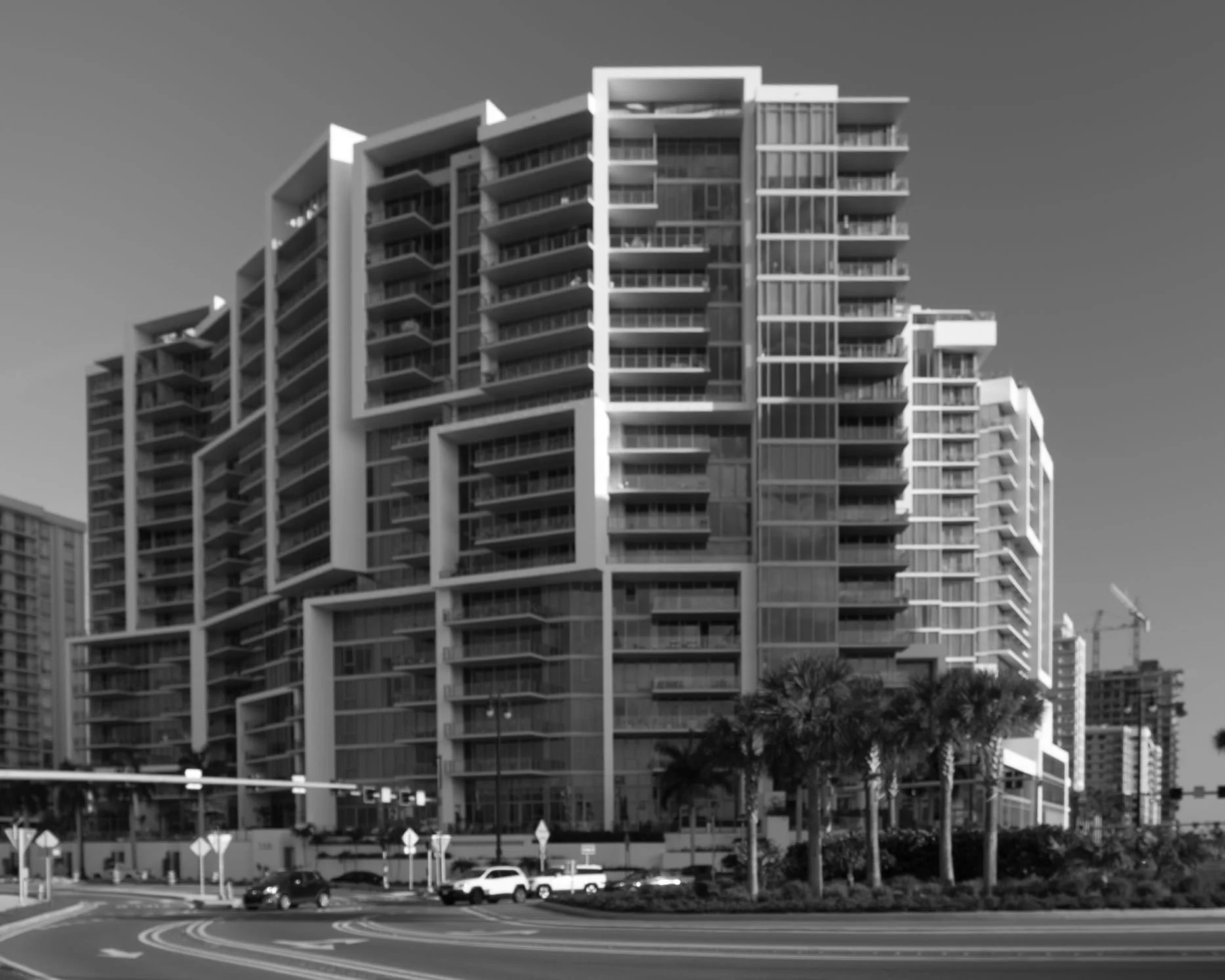 The Vue Sarasota Bay at 1155 N Gulfstream Avenue — 141 luxury residences with 10-foot floor-to-ceiling impact glass, glass scratch repair by Glass Restoration Inc.