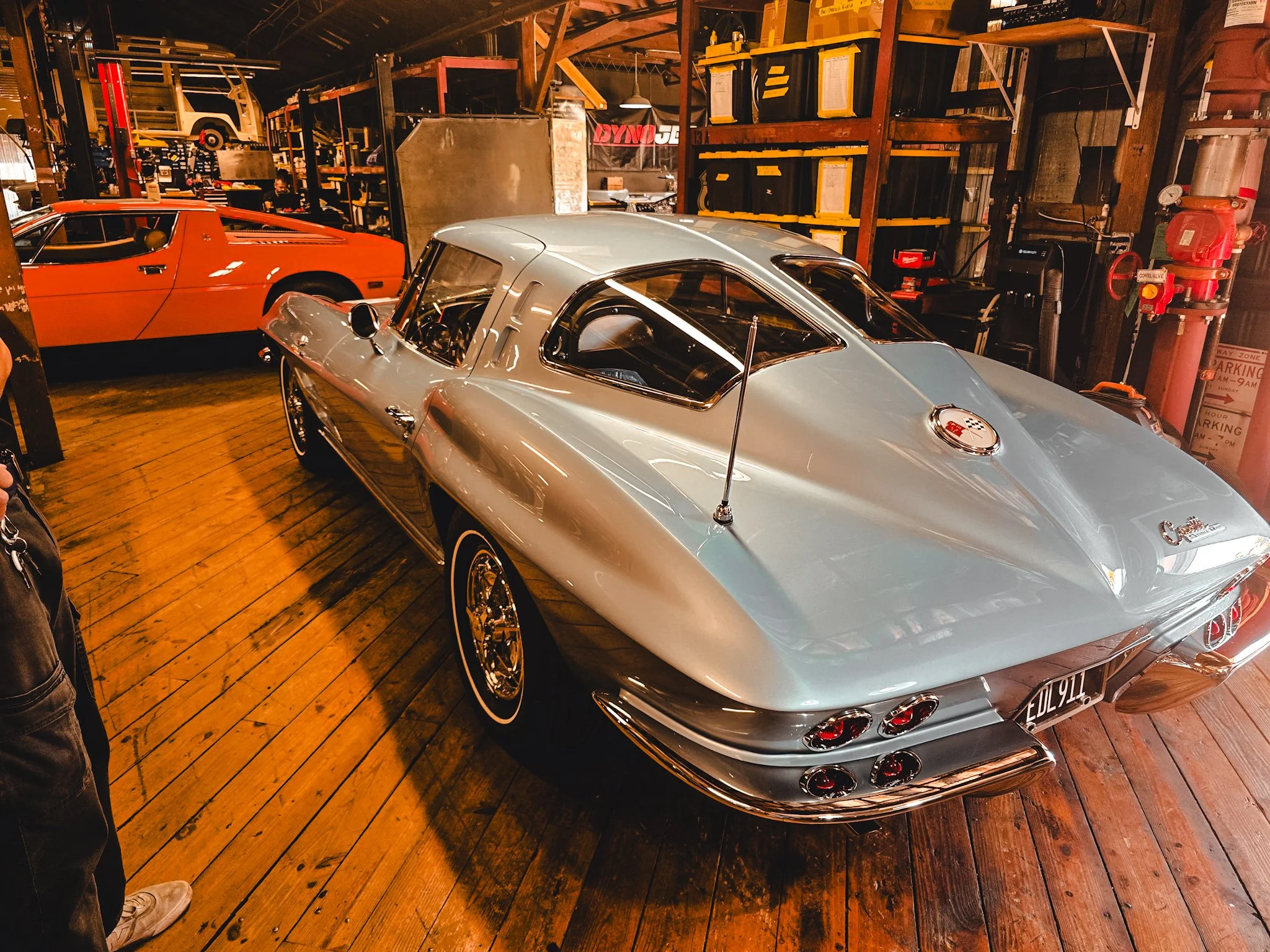 1963 Corvette at The Creative Workshop in Dania Beach FL — split rear window glass restored by Glass Restoration Inc., one of the most recognized curved glass pieces in the classic car world.