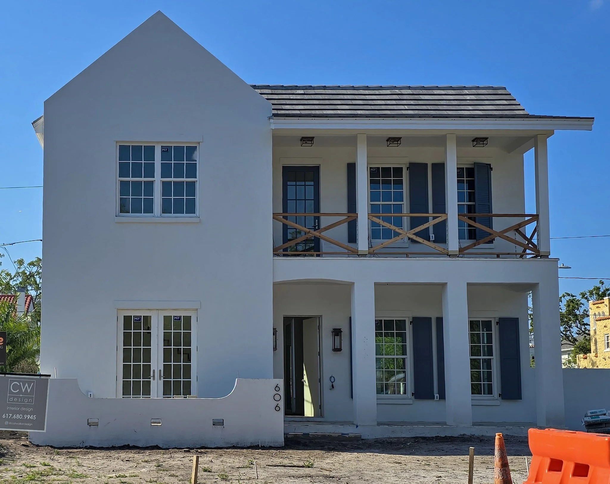 New construction home built in early 1900s architectural style in Dunedin FL — Glass Restoration Inc. provides builder punch list glass scratch repair on new and historic style homes throughout Dunedin and northern Pinellas County