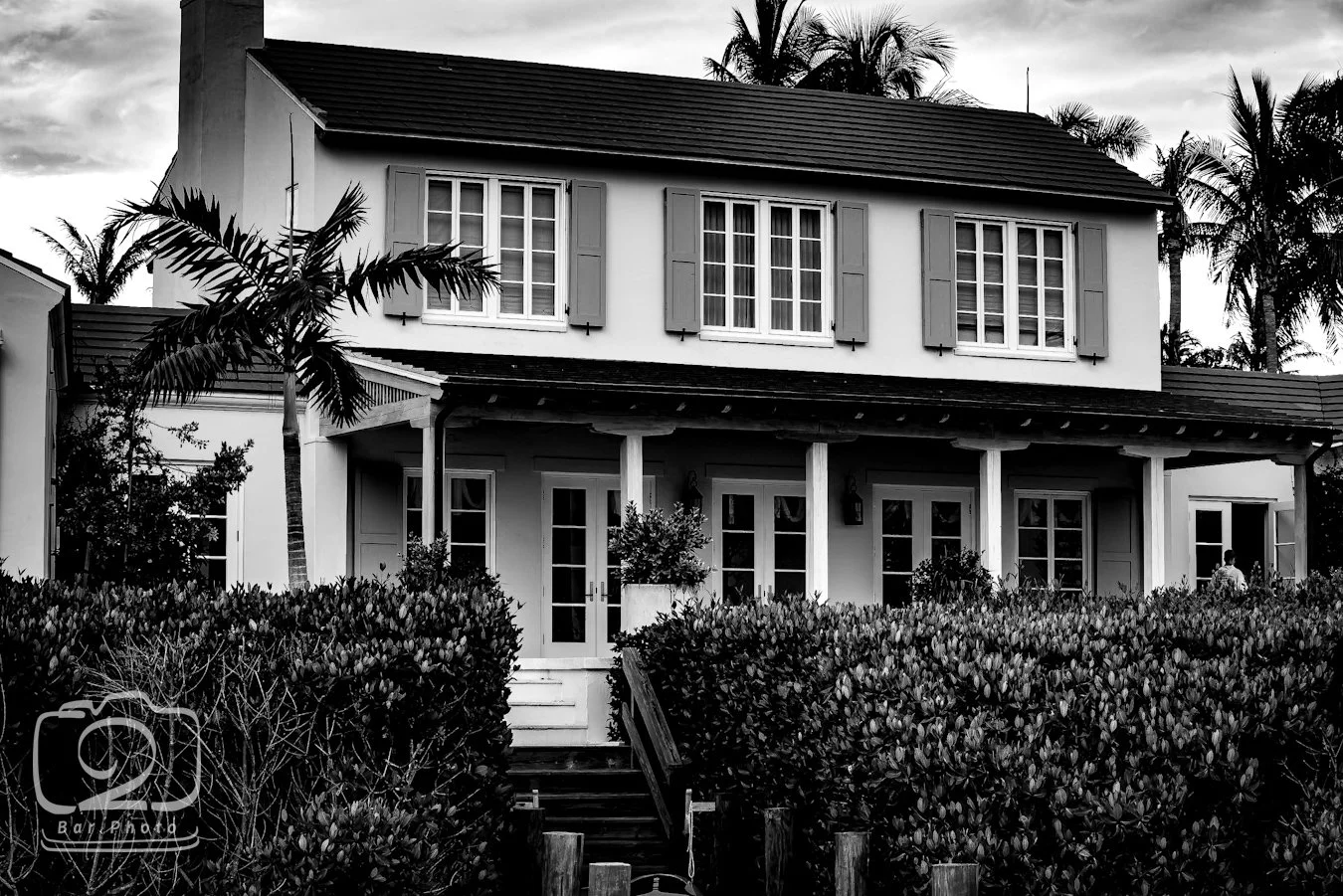Classic Florida architecture with lots of glass, including back yard views through Sliding Glass Doors.