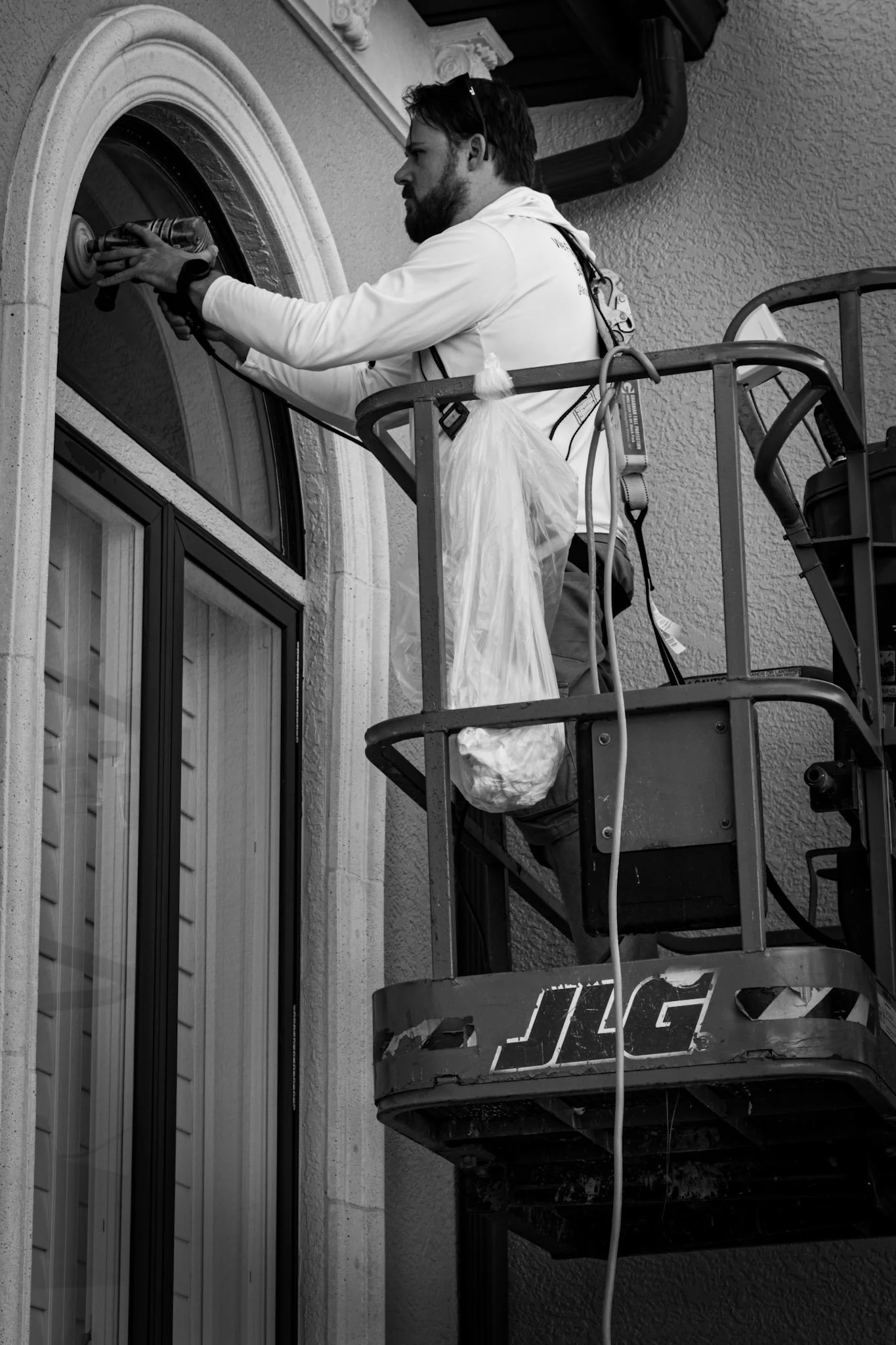 A longboat Key job required extra access equipment. We handle that for you and restore your glass.