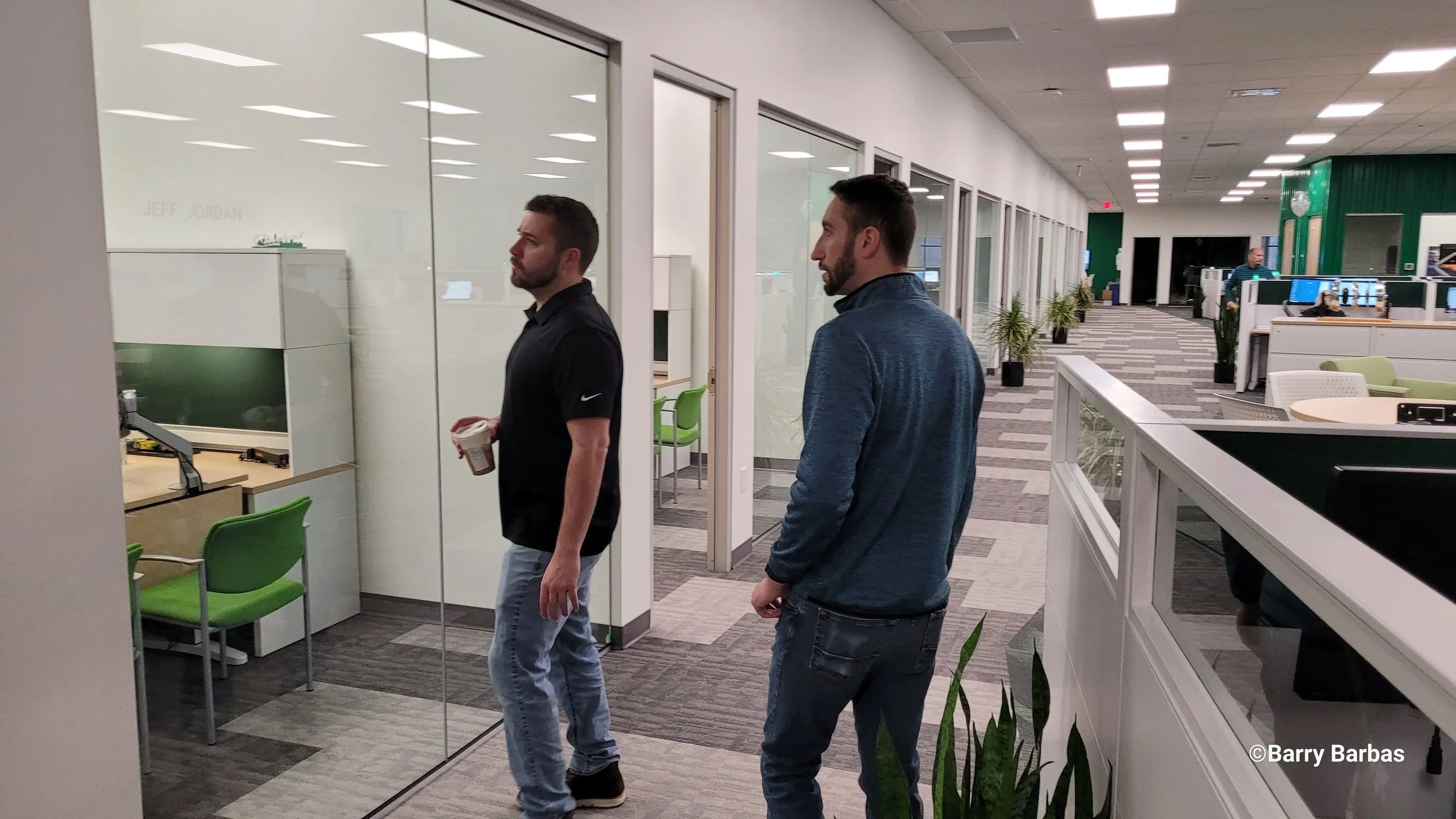 Large-scale architectural glass restoration at a corporate headquarters in North Royalton, Ohio; removing surface damage and restoring clarity to exterior commercial glazing.