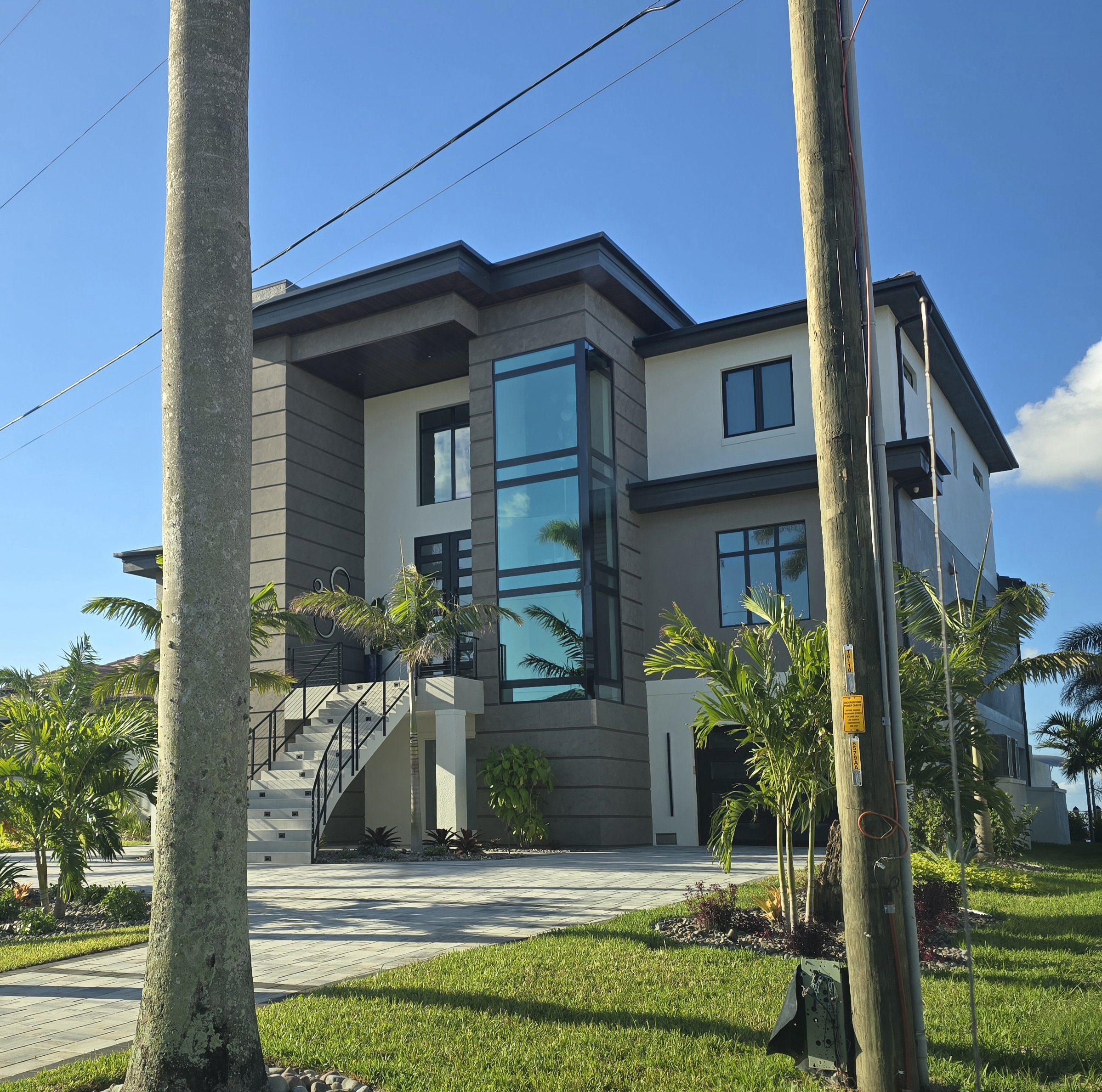 Custom two-story Gulf-front estate home on Upper Longboat Key — Glass Restoration Inc. the glass restoration specialists for North Longboat Key Manatee County