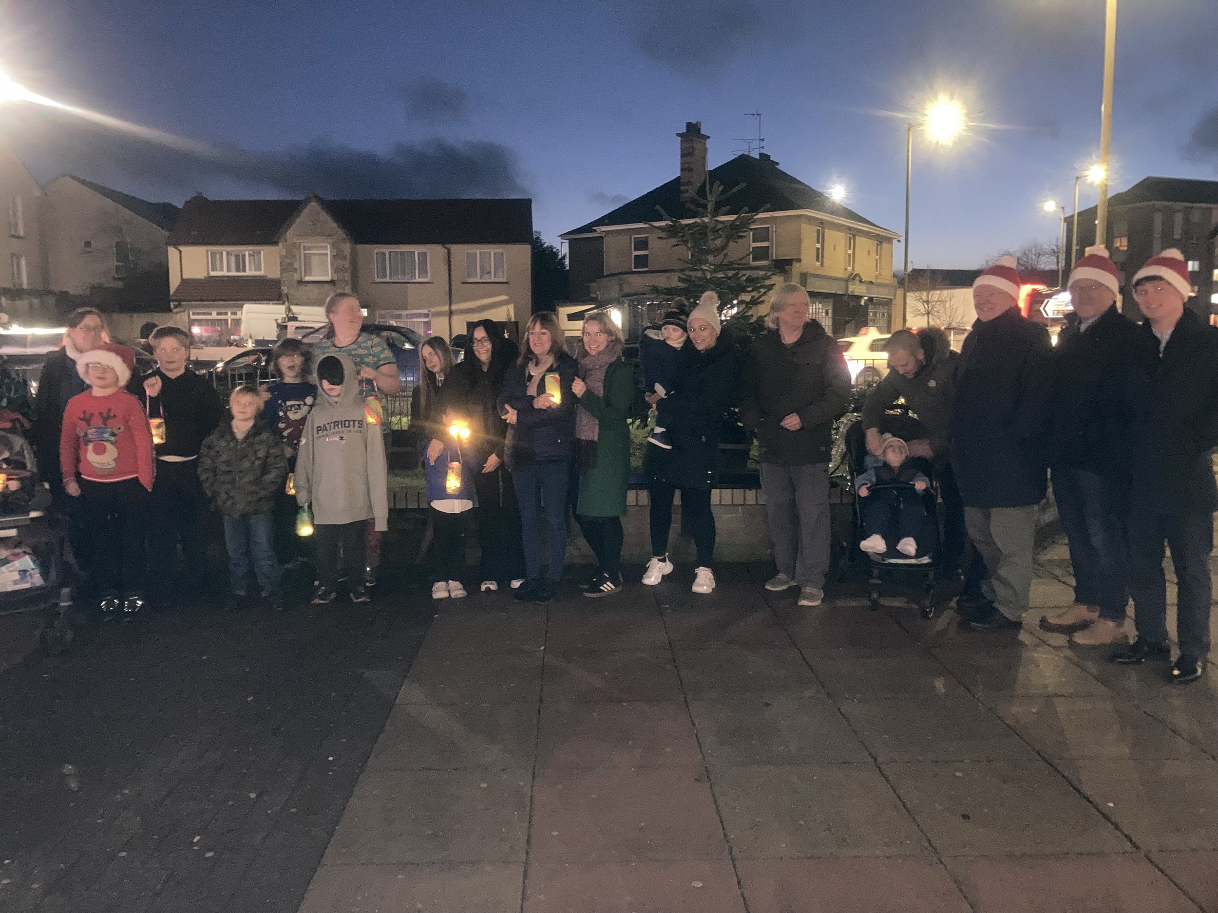 A group gathered from the community to celebrate the switching on of the lights.