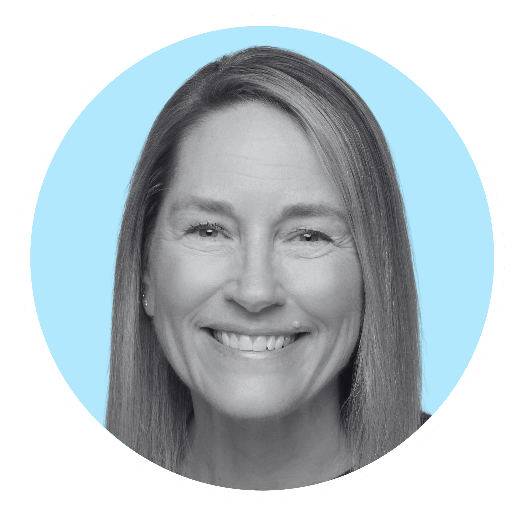 A black-and-white headshot of a smiling woman with shoulder-length hair, wearing a dark blazer and hoop earrings, set against a light blue circular background.
