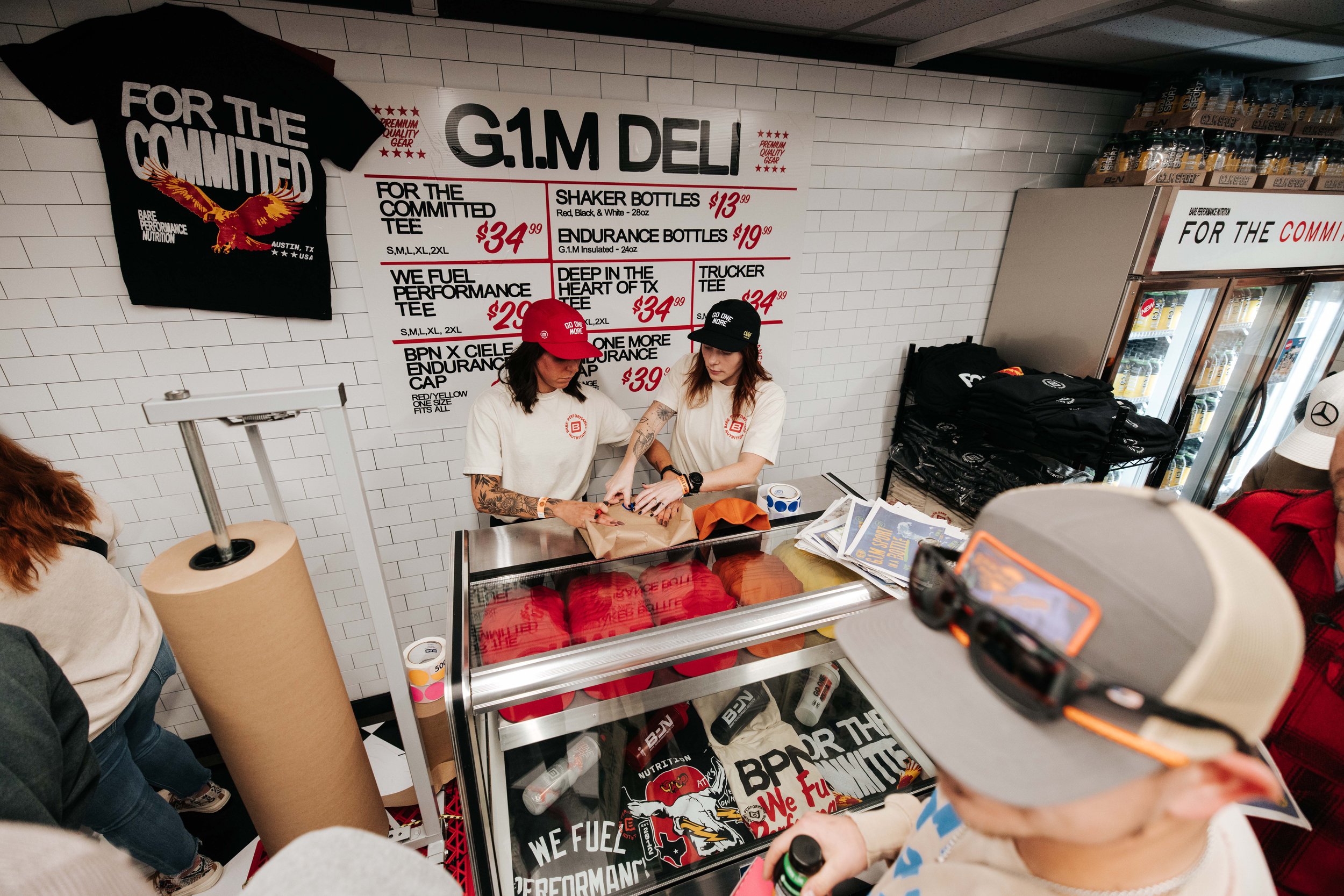 Functioning merch deli! I didnt want to just hang our shirts up like we always do. We created an experience for the customer to remember. They asked for their specific item and size and it was wrapped for them in butcher paper, just like your sub wou