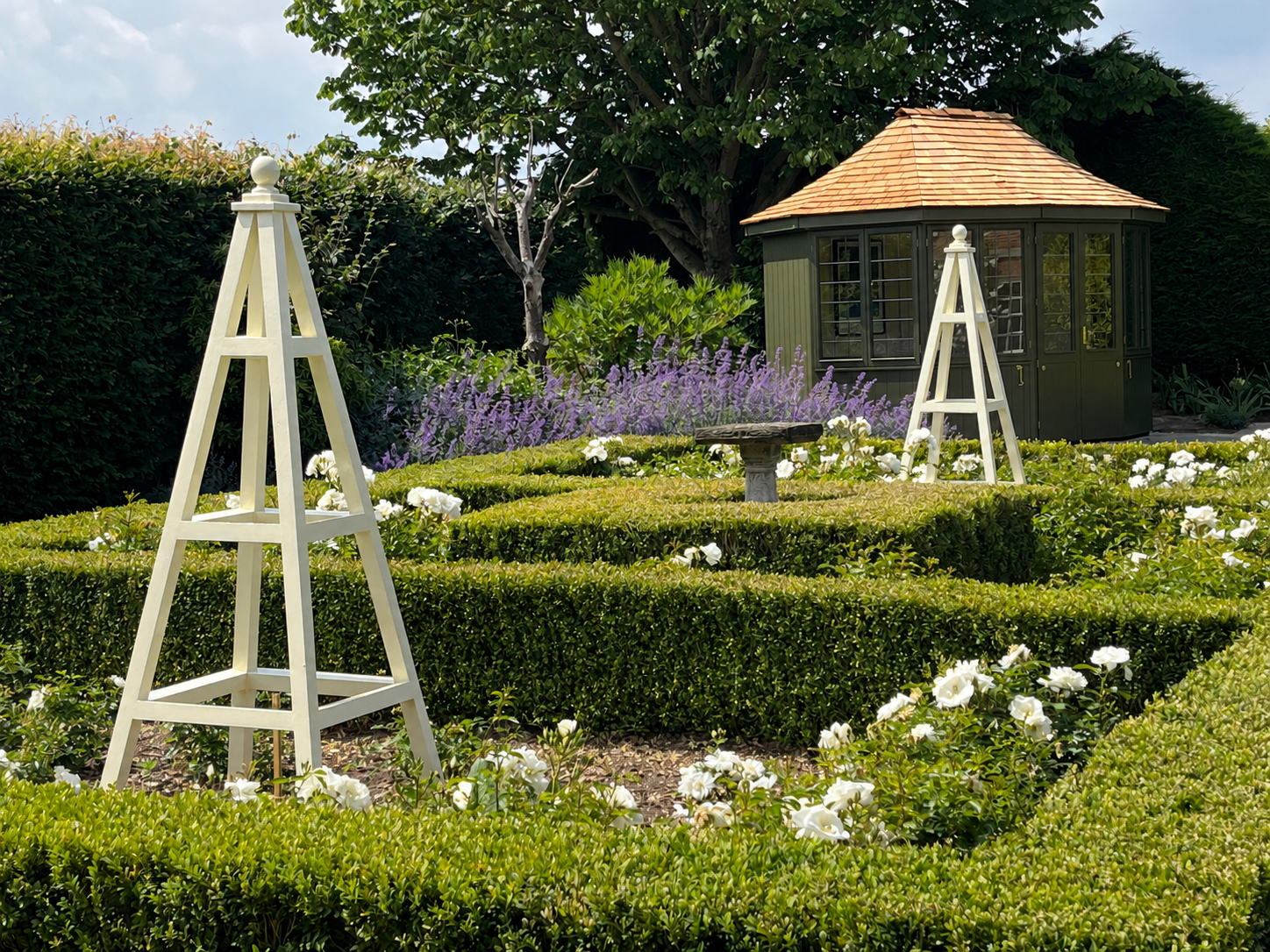 obelisks_white_roses.png