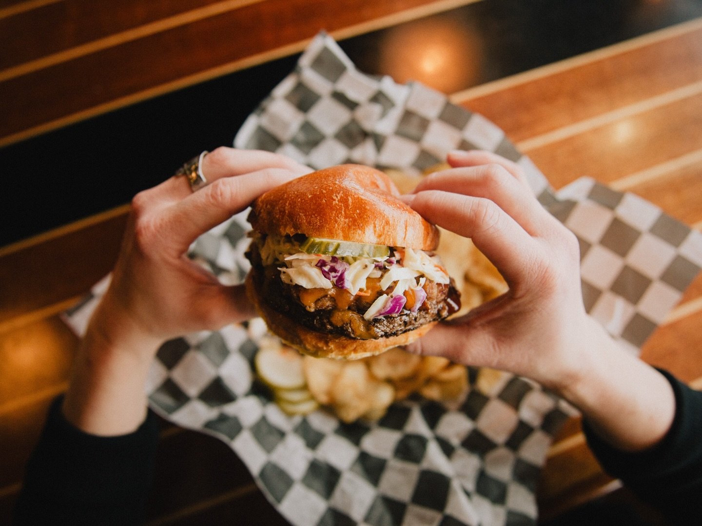 We&rsquo;ve entered a new burger to the Betsie Bay Burger Battle this year!

New to the menu: &lsquo;The Barnyard Burger&rsquo;
A griddled all-beef patty topped with melted aged cheddar, pulled pork, creamy coleslaw, house pickles, and our house BBQ 
