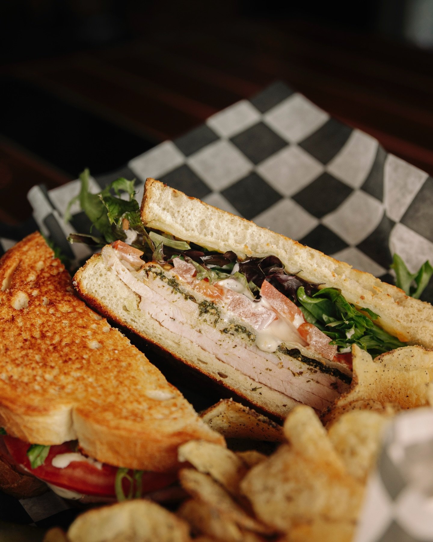 Check out our newest sandwich special: Turkey Pesty

Thick sliced turkey, house pesto, white cheddar, fresh lettuce, sliced tomato, and creamy garlic aioli, all toasted between two slices of sourdough.

*Comes with you choice of Great Lakes Chips or 