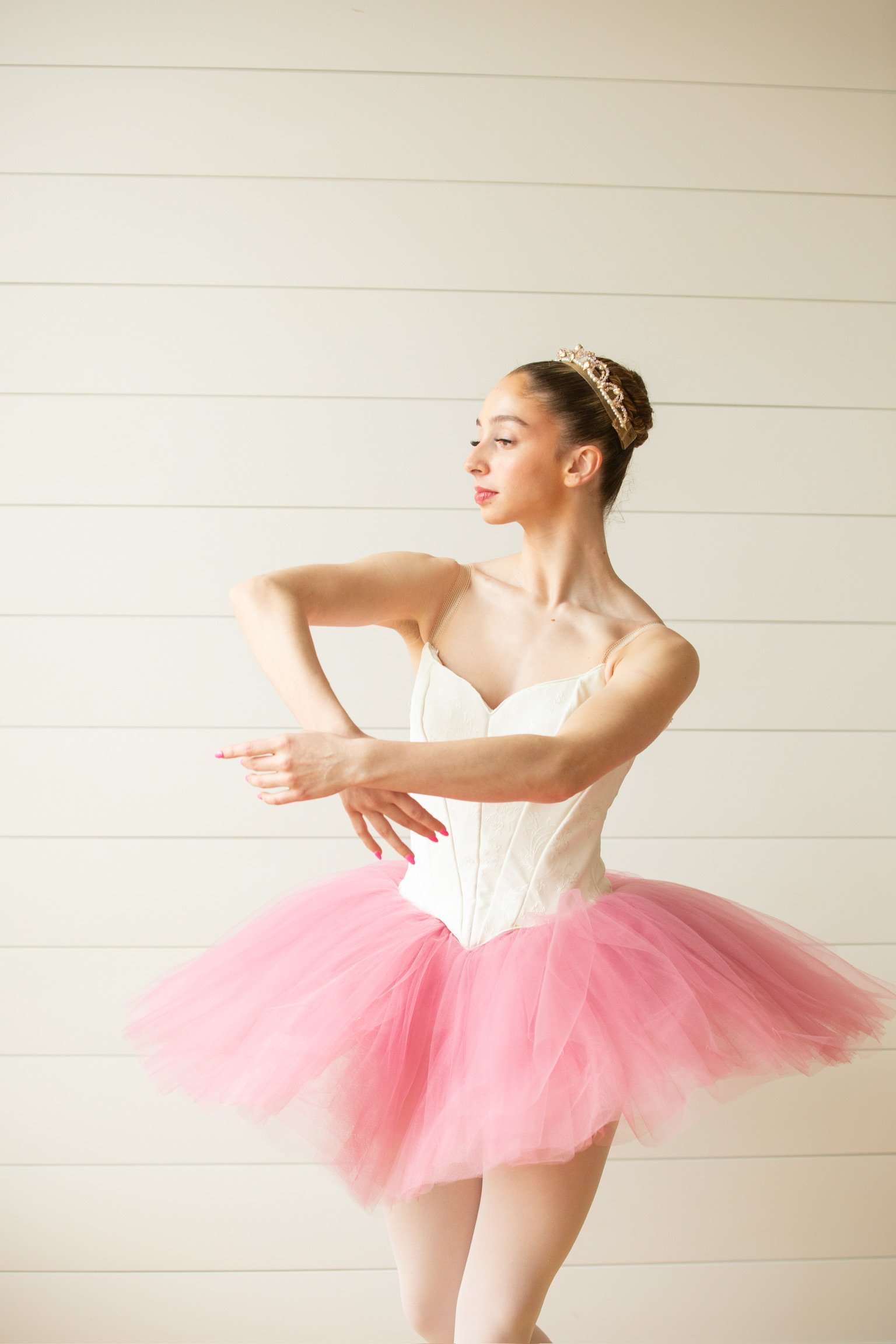 Professional ballerina dancing in a fitted russian, longline bodice designed by Le Chaton Tutus. 