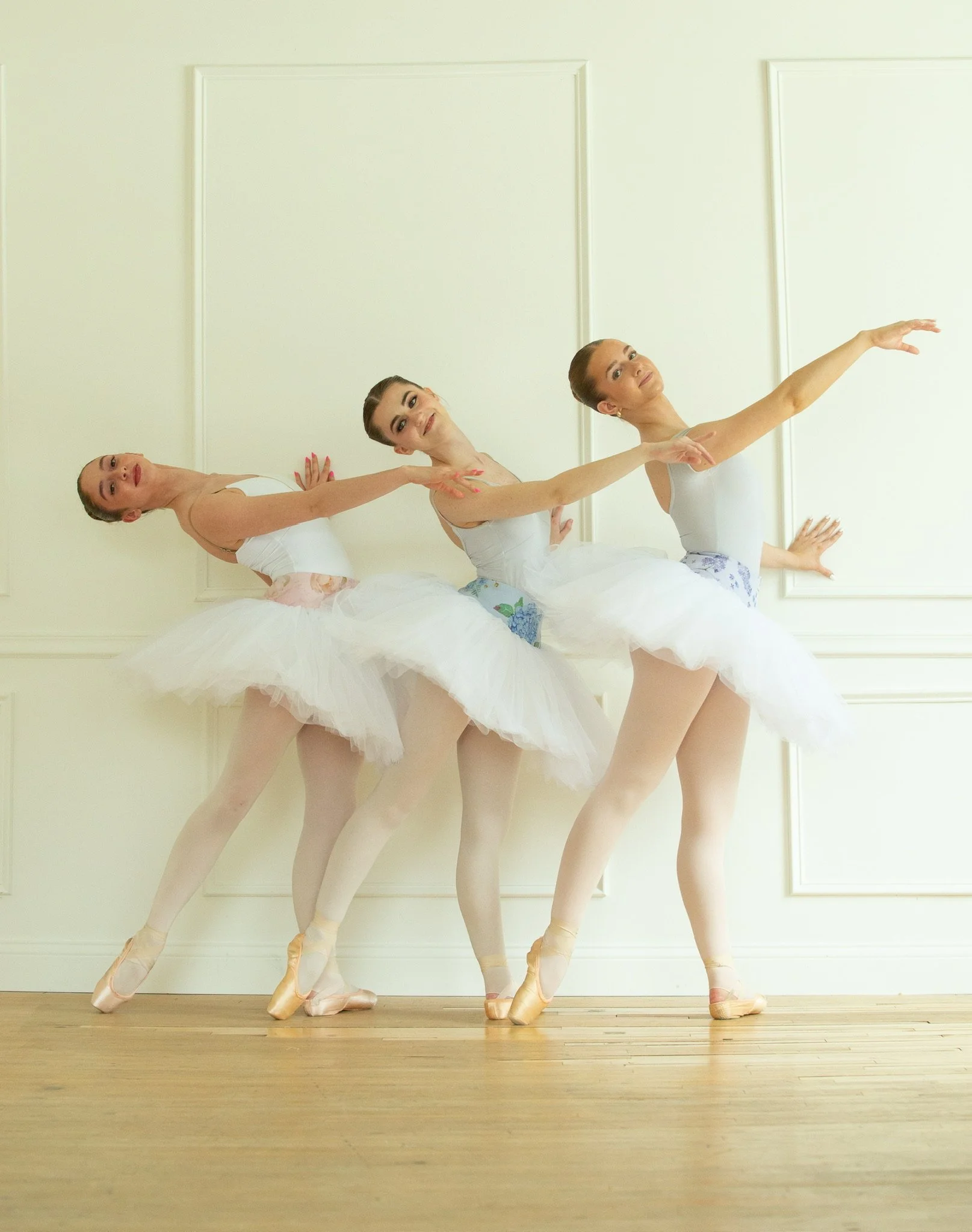 Professional ballet dancers posing in their Le Chaton soft classical practice tutus. 
