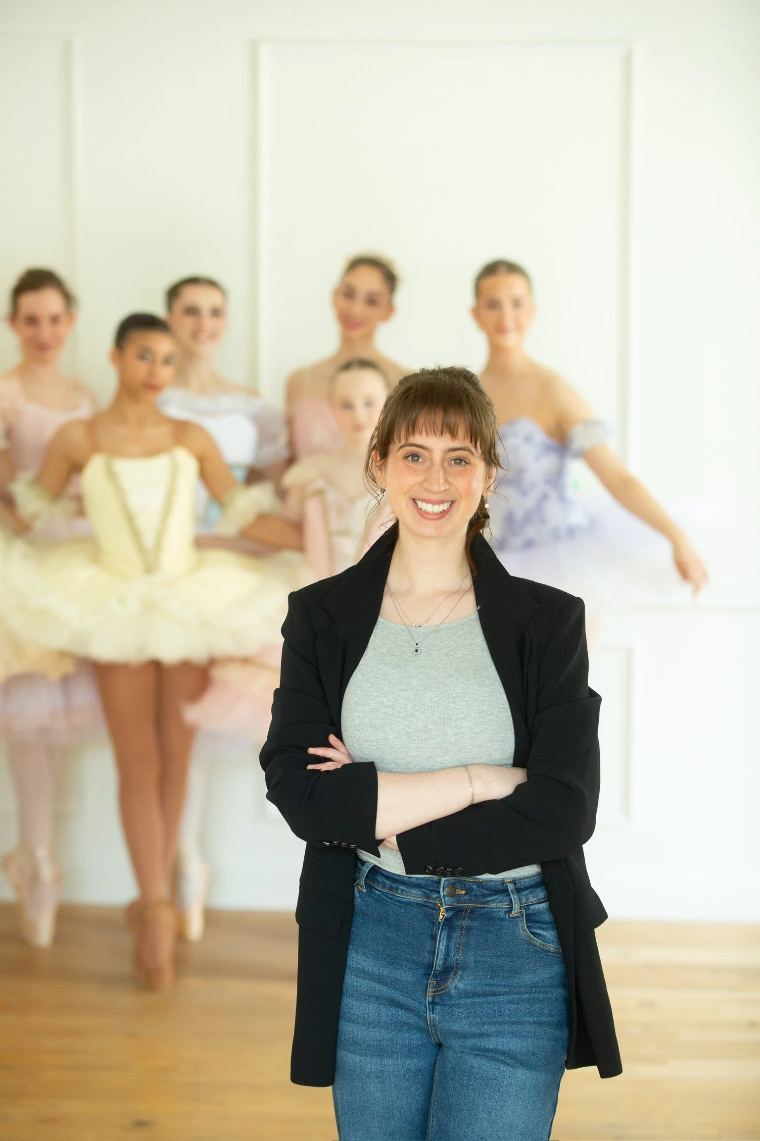 Founder and owner of Le Chaton Tutus posing with her models during the annual photo event.