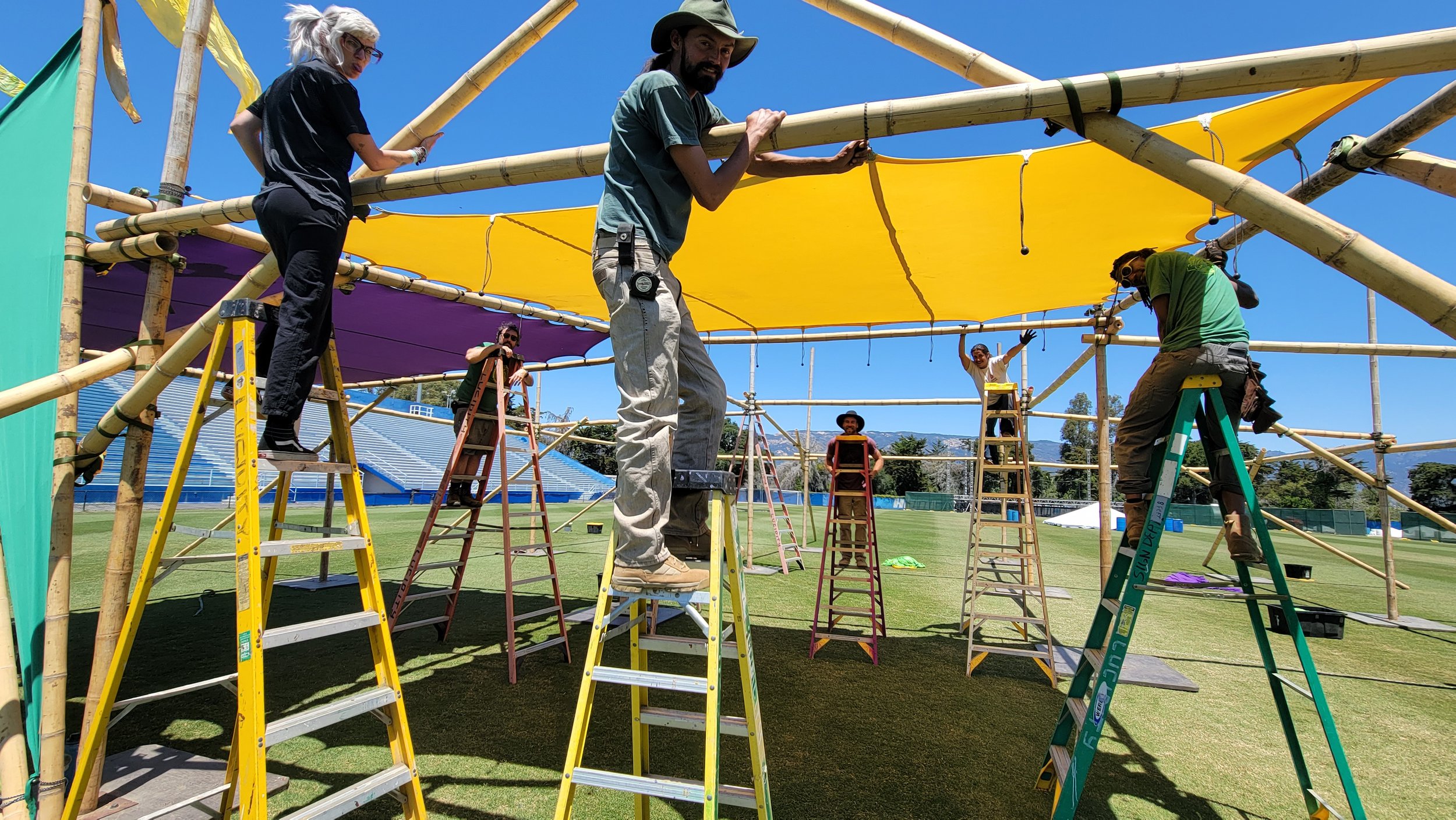 Flying Shade Team at Work on Ladders.