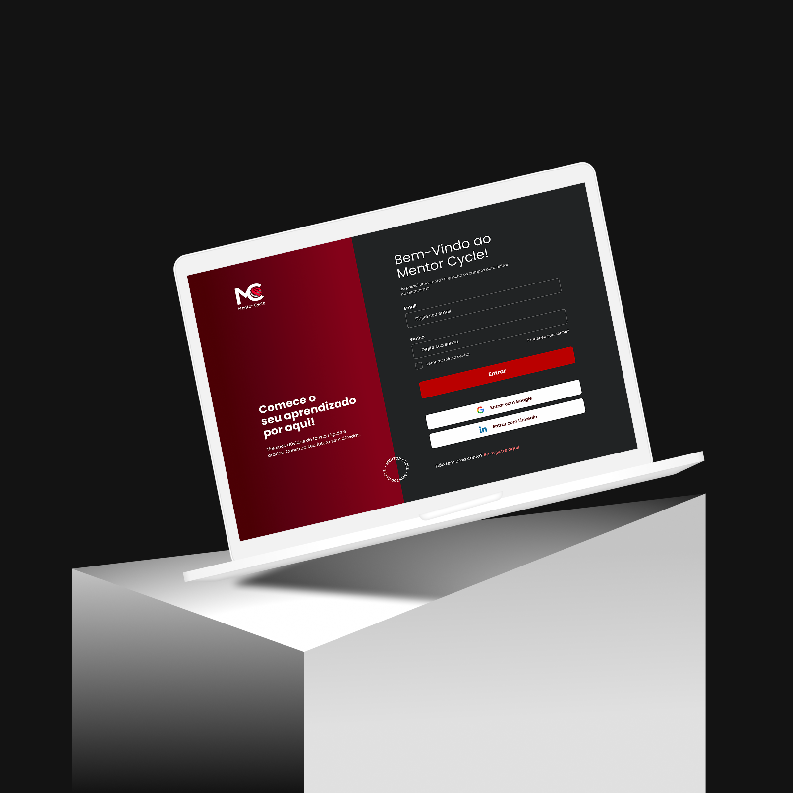 Laptop displaying a login page for Mentor Cycle on a white pedestal against a black background.