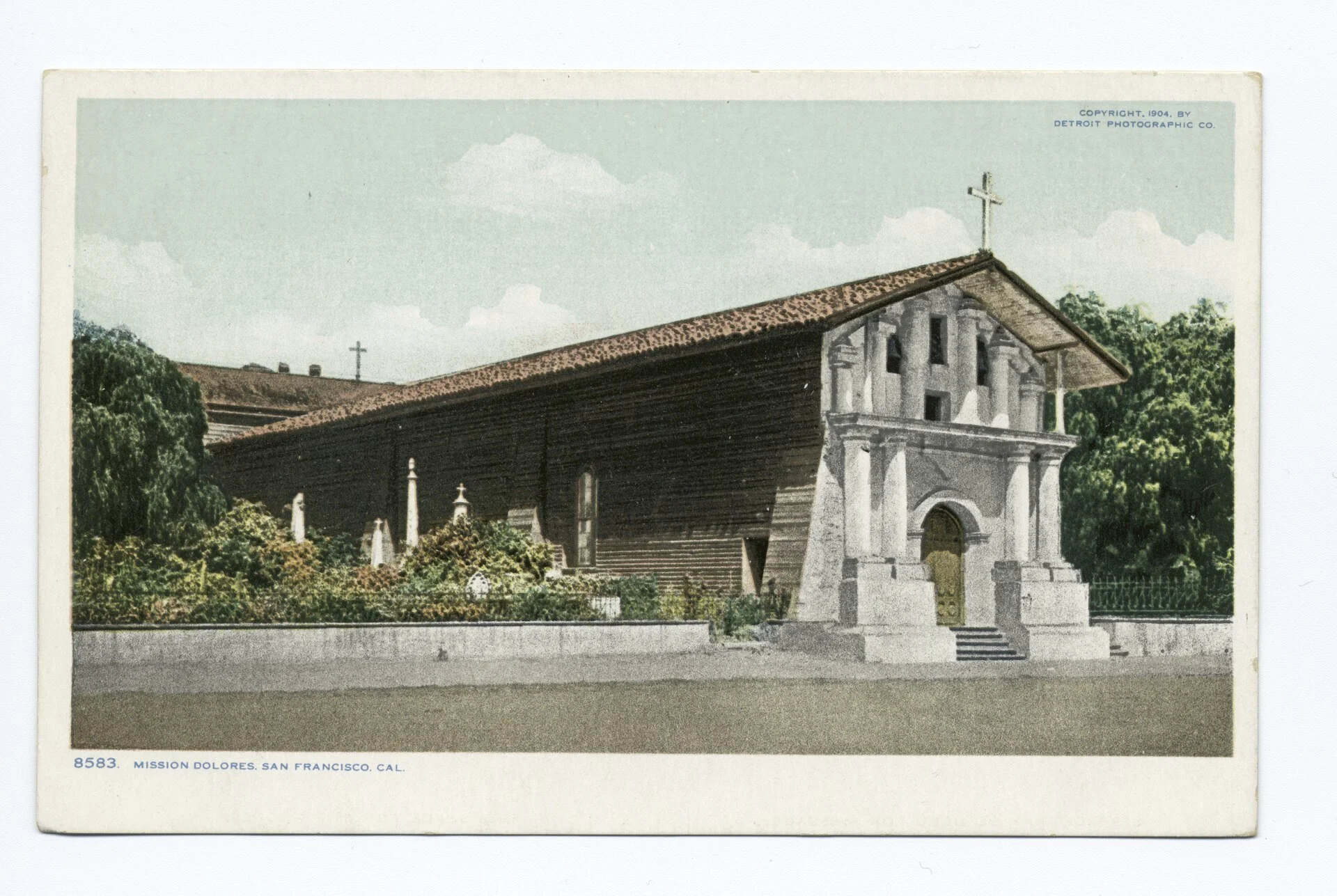 A hand-colored 1904 postcard view of Mission Dolores in San Francisco.