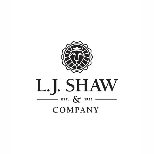 L.J. Shaw & Company logo with a lion's head emblem at the top.