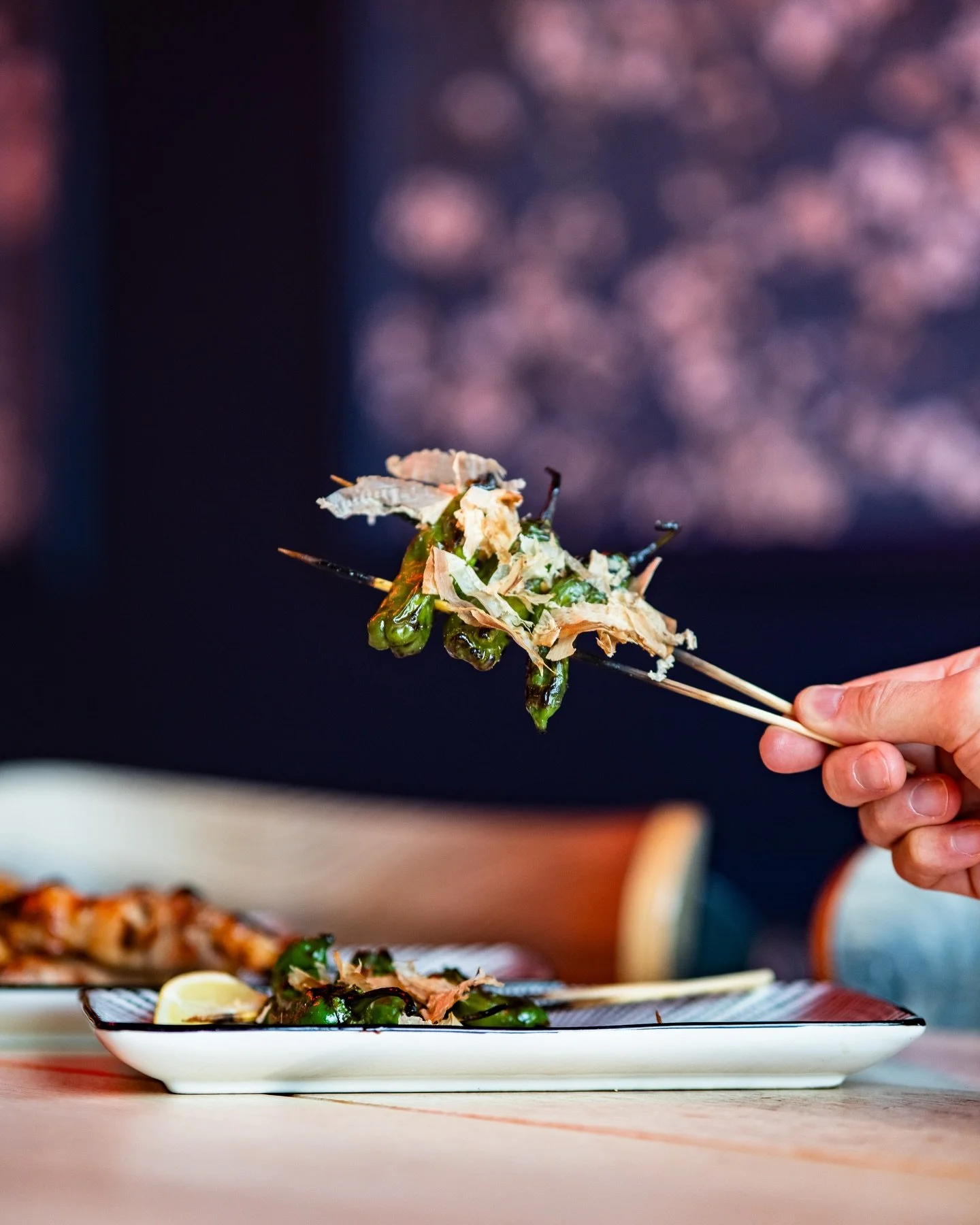 Blistered shishito peppers grilled over binchotan charcoal and finished with fluttering bonito flakes. Smoky, savory, and dangerously easy to keep reaching for.

Perfect with a drink. Or two🍻

#columbusohio #columbusfoodies #izakayaryu #ohiofoodies 