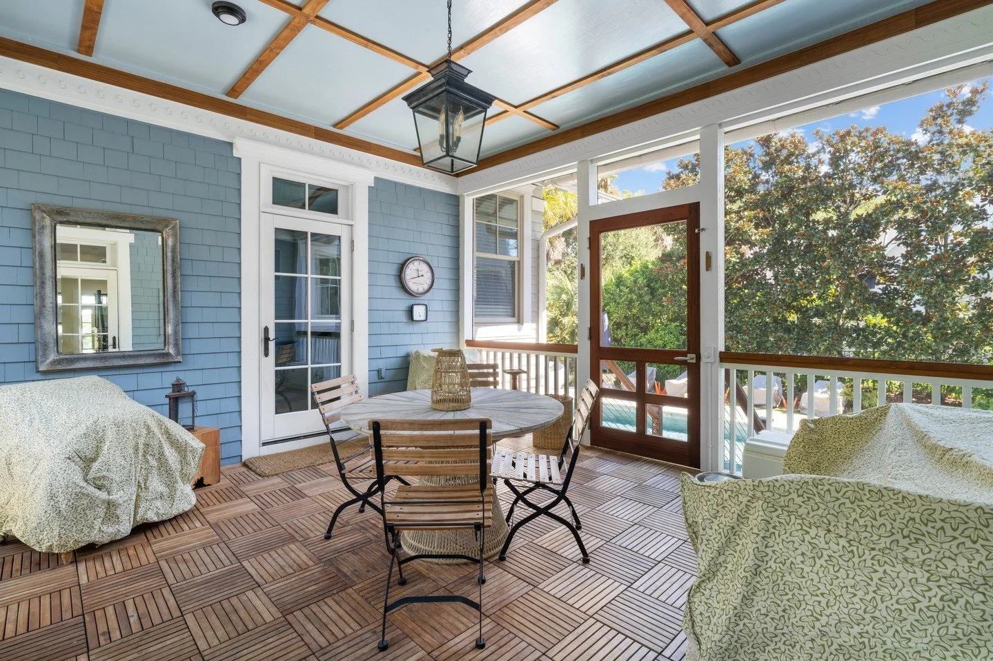 The first photo showcases the latest round of updates we've just completed at Marsh Point Developers &mdash; complete with custom teak doors and rich teak accents that instantly elevate the entire vibe of this screened-in porch.⁠
⁠
We originally reno
