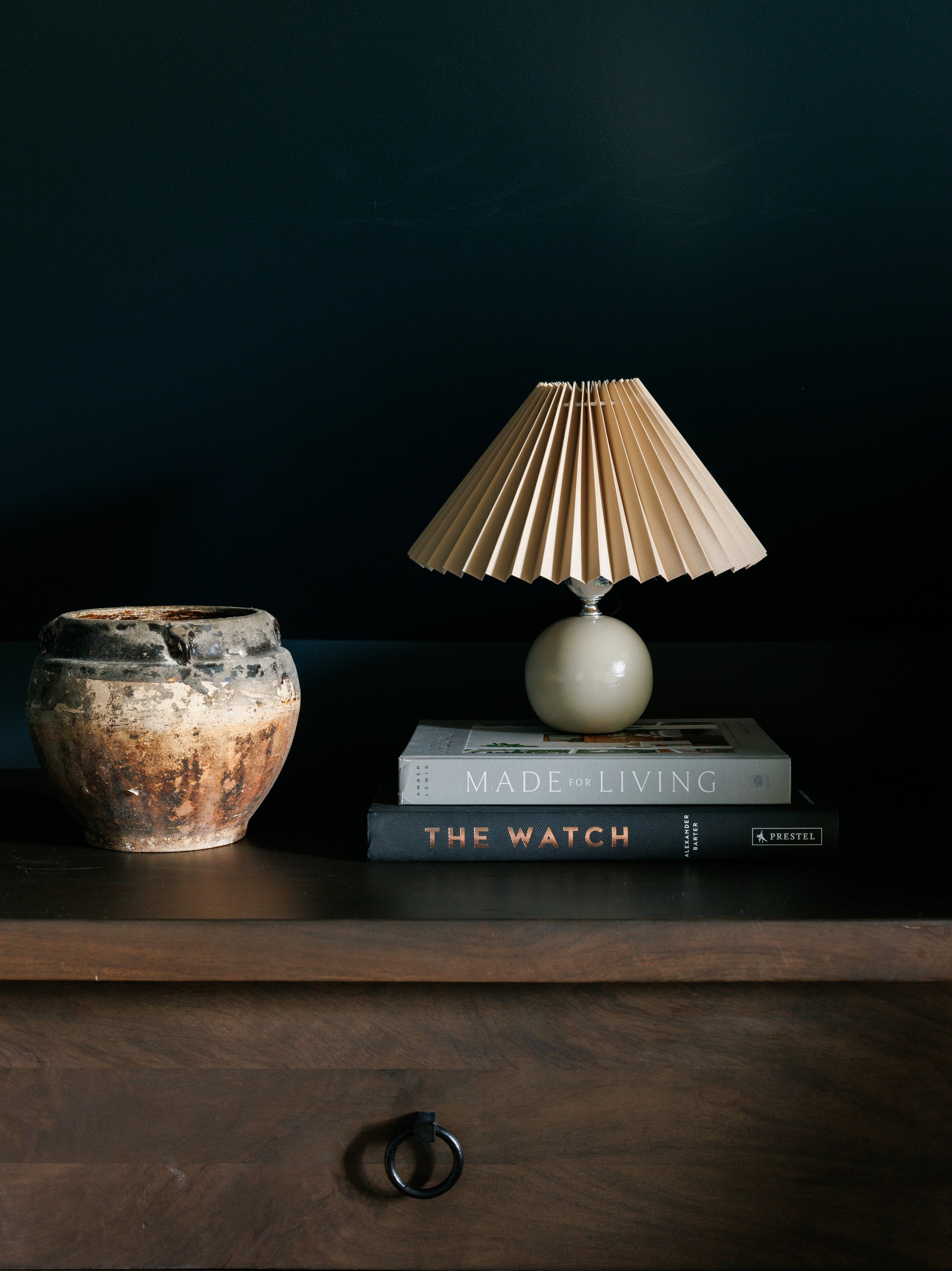 Collected, lived-in bedroom with mid-century details and soft florals