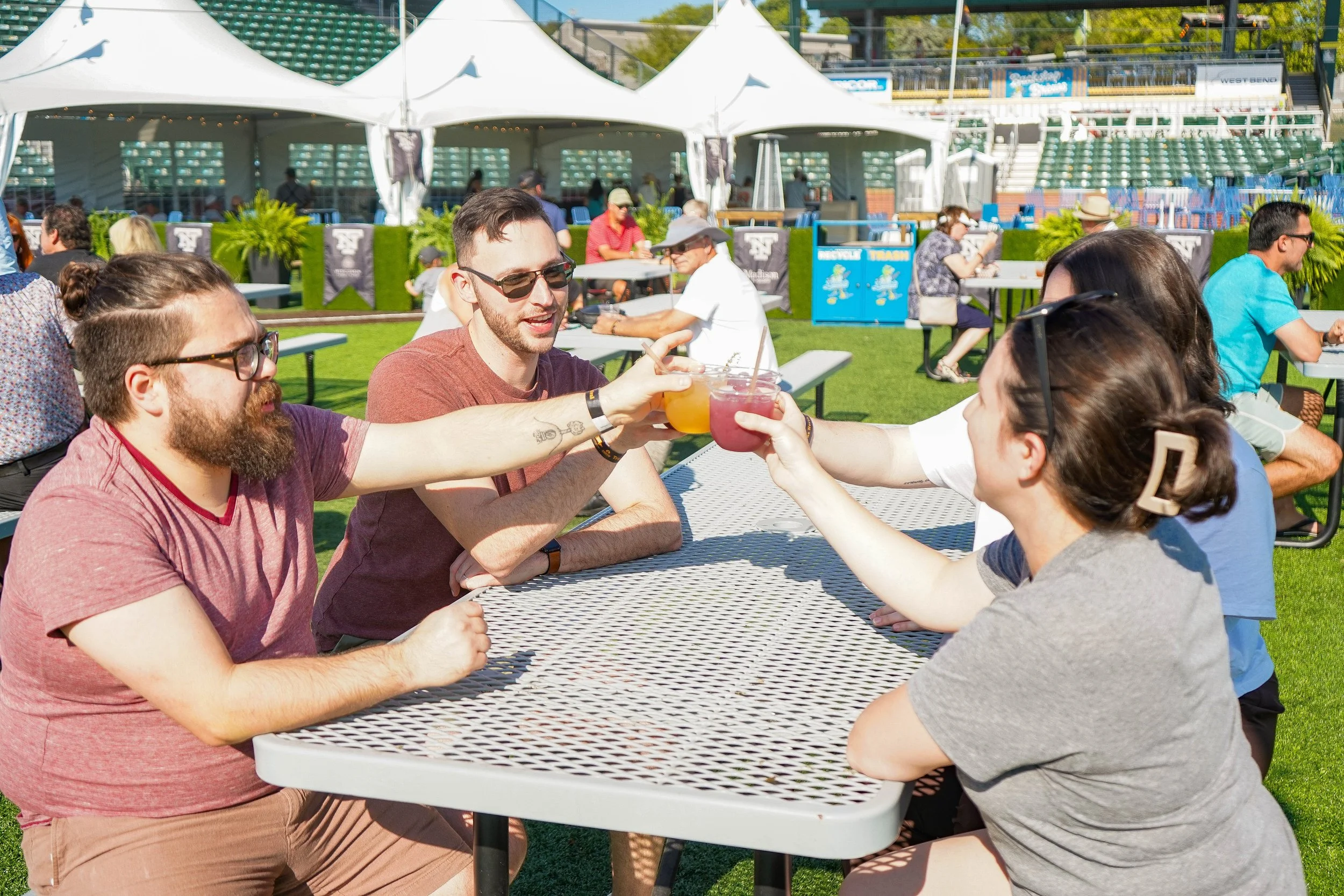 ATMO_TrueNorth_Fans_Enjoying_Drinks_Cheers_Good.jpg