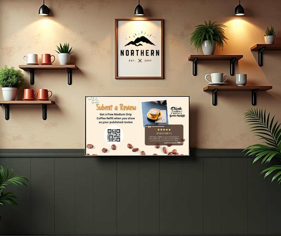 Interior of a cafe with a beige wall, black shelves holding potted plants and mugs, a framed sign that says with a mountain logo, a digital display promoting free medium drip coffee refills for reviews with a QR code and coffee beans decoration.