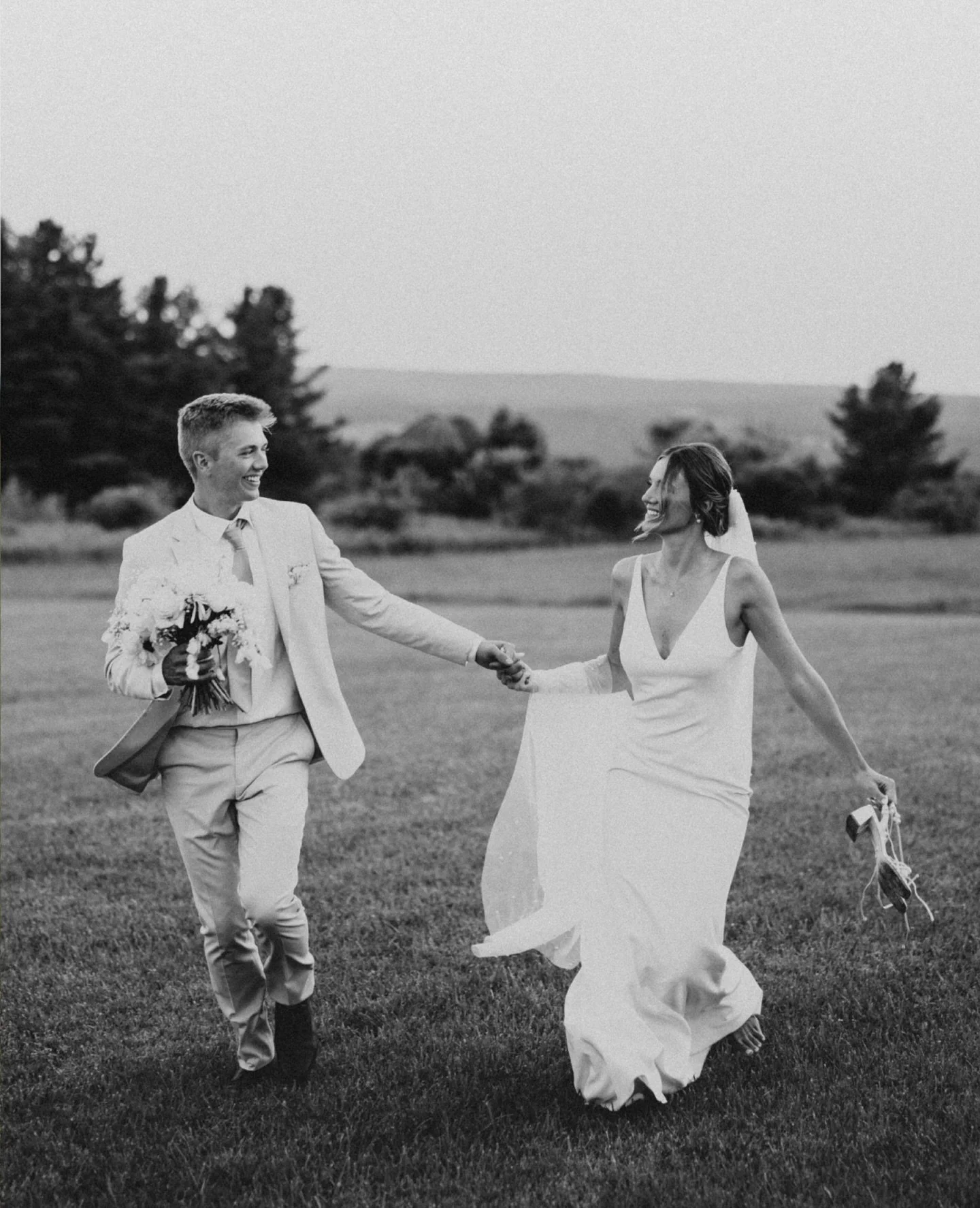 This is your sign to schedule a little time in the night to sneak away with your new husband or wife. The day is busy, everyone wants your attention, trust me when I say even 10 minutes away just the two of you will be SO worth it 

Second shot for m